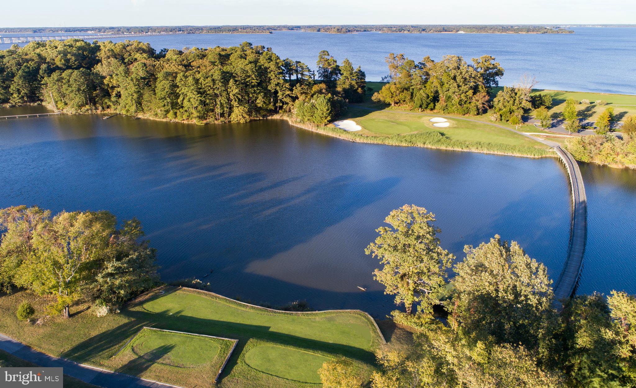 This 2732 Marsh Elder Road building lot is surrounded by gorgeous new builds yet over looks the lush 17th hole from the tees to the creek to the greens and ponds of the highly-esteemed Hyatt Golf Course.  Enjoy resort living all year round when you build your dream house within the confines of the beautiful Hyatt Regency Chesapeake Bay Golf Resort, Spa and Marina!  This lot not only looks directly on to the17th hole yet has vistas incorporating  the banks of the mighty Choptank River!
The new owner of this fabulous lot will enjoy the soon-to-be-completed amenity package of a very large swimming pool, pickle ball/tennis courts, tot park, and beautifully appointed club house.  If you enjoy fine dining, golf, tennis, boating, swimming or merely strolling along beautiful trails then the Hyatt compound may be perfectly suited for you.  
Ideally located just 1 hour from the pristine beaches of Ocean City, 1.25 hours from Annapolis, 2 hours from either Washington, DC or Baltimore, and finally 2.5 hours from Philadelphia...the city of Brotherly Love...or 4 hours from the Big Apple...this home base is perfect for easy travel to operas, symphonies, museums, world-class shopping & dining, Broadway or the calming waves of the great Atlantic Ocean!