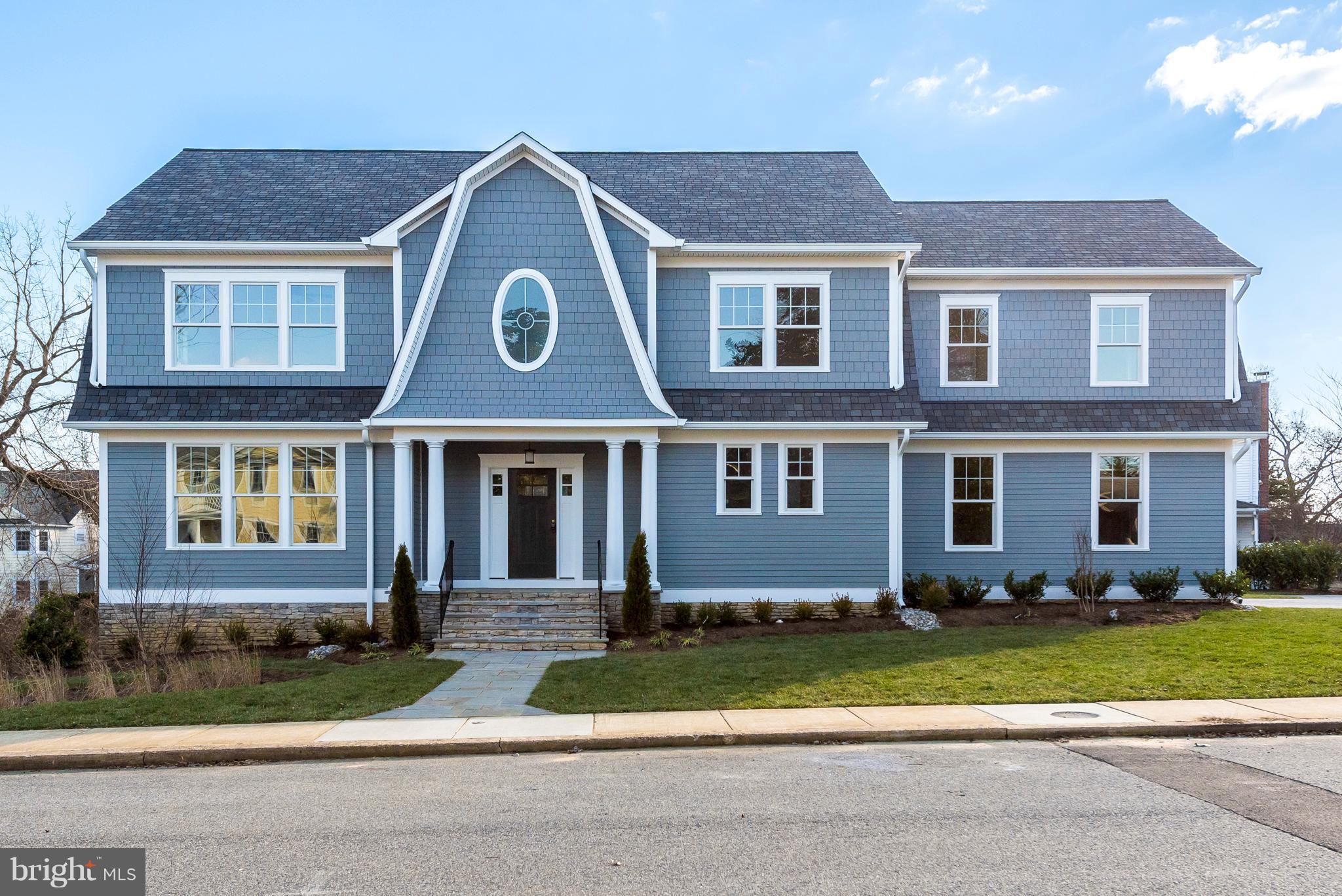 New custom home located in the established, upscale and walk to town Annapolis community of Murray Hill. Well appointed with careful attention to detail, this spacious home offers open concept living with 9 ft ceilings, hardwood floors, coffered and tray ceilings, and attractive wainscoting. The light filled main level exudes warmth and comfort from the family room with custom built-ins and fireplace to the French doors that open the screened porch with stone fireplace. Enjoy the large gourmet kitchen with stainless, granite and quartz counters, Subway tile, island and wine bar. Offering 5 bedrooms and 4.5 baths including master suite with luxurious bath and 2 walk-in closets, en suite guest bedroom, 2 bedrooms with shared Jack & Jill bath, and a  finished lower level with 5th bedroom, full bath and recreation room. Finished 2-car garage with paver driveway. Gas heating and cooking. Hardie-plank exterior. Steps from waterfront parks on Spa Creek, Maryland Hall for the Arts, restaurants and shops.