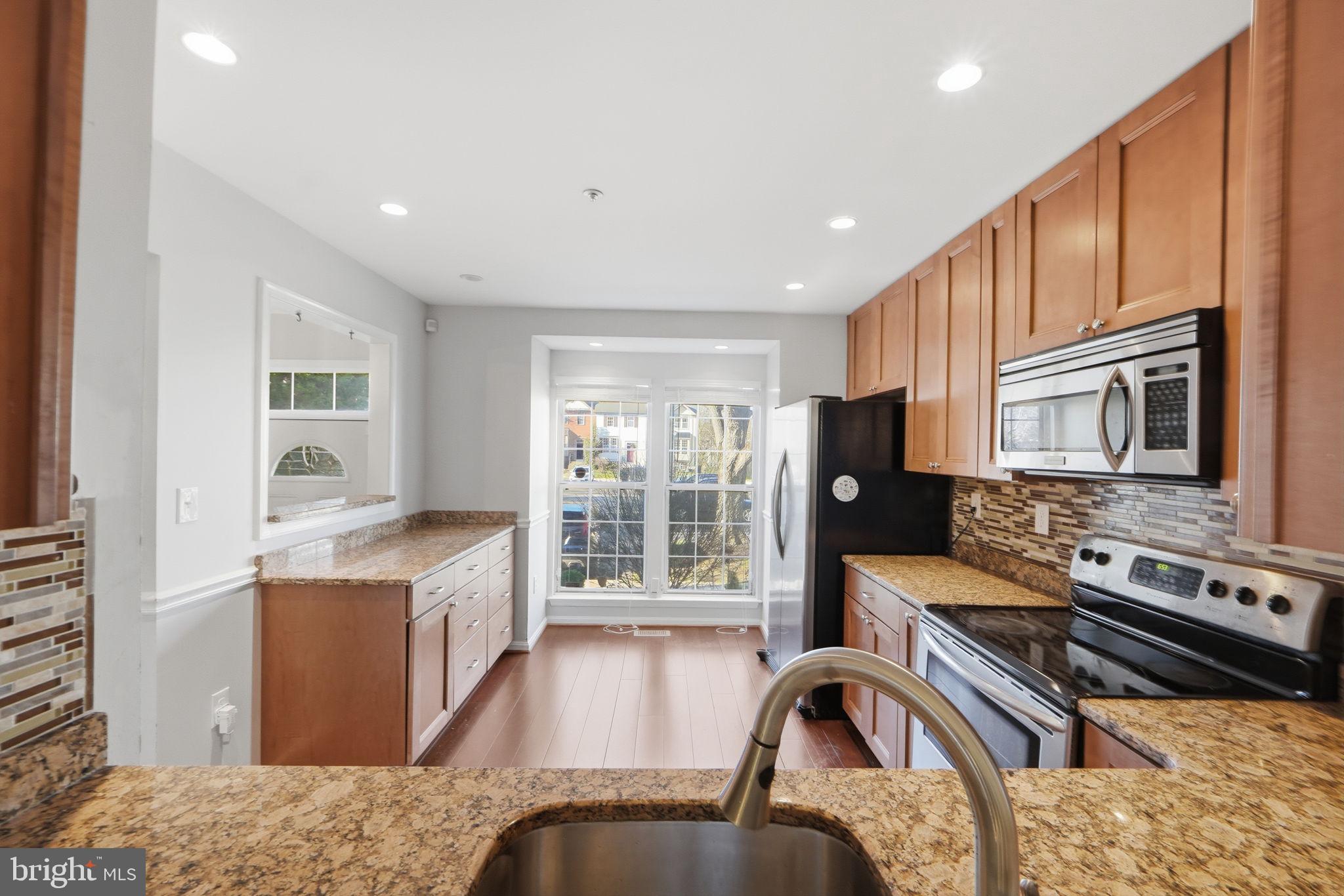 Welcome to this beautifully updated 3-level townhouse in a highly convenient location!

This well-maintained home features 3 bedrooms and 2 full bathrooms on the upper level, offering comfortable and functional living space. The main level boasts an open-concept layout, seamlessly connecting the living area, dining space, and kitchen—perfect for both everyday living and entertaining. A convenient half bathroom is also located on this level, along with direct access to a private fenced backyard.

The home was fully renovated in 2018, with additional updates including a brand-new refrigerator and major systems such as the roof, HVAC, and water heater all approximately 5 years old, providing peace of mind for years to come.

The finished basement adds incredible flexibility, featuring a full bathroom and a spacious room that can be used as a guest suite, home office, or recreation area. There is also additional space ideal for a playroom, gym, or extra storage.

Located in a prime Bowie location, this home offers easy access to Northwest Stadium, major highways, shopping centers, and everyday conveniences, making commuting and daily living effortless.

A great opportunity to own a move-in ready home with space, updates, and location all in one!