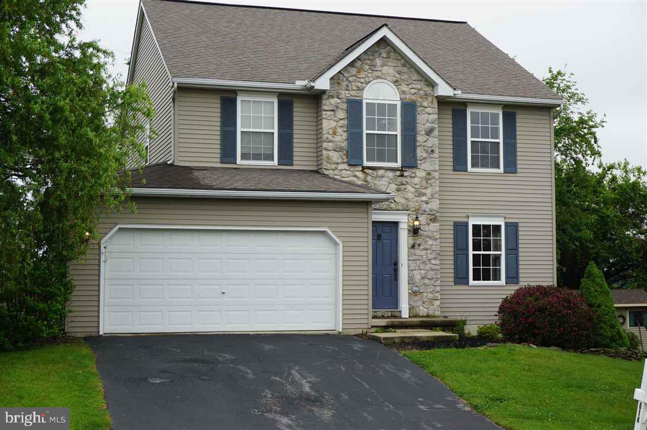Beautiful 2420 sq ft 4 BR 2.5 bath home in Dallastown School Dist.  Open floor plan with 1st floor hdwd floors, stainless steel appliances, glass backsplash, spacious BRs, MBR has 2 w/in closets & vaulted ceiling, finished basement w/gas FP, french doors lead to cobblestone patio and private fenced yard.  New paint & carpet.  Tasteful inside and out.