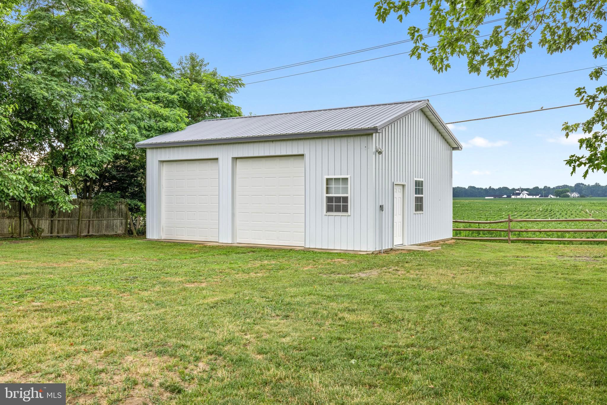Opportunity meets location at this charming 1891 farmhouse situated on a spacious ¾-acre lot just a few short miles off 301 . Located within the Village Center District, this unique property offers the flexibility and visibility that entrepreneurs, tradespeople, hobbyists, and investors have been searching for. And NO TOWN TAXES. The home features 3 bedrooms and 2 full baths, blending historic character with thoughtful updates including granite countertops and stainless steel appliances. Outside, the standout feature is the impressive 32' x 24' detached garage with two 10' x 10' doors, providing ample space for a workshop, storage, equipment, vehicles, or business operations. Whether you're looking for a place to call home, a property with room to grow your business, or a combination of both, the possibilities here are hard to find. Enjoy the convenience of being just minutes from downtown Centreville, schools, shopping, dining, and major commuter routes while maintaining the space and flexibility that only a property like this can provide. Bring your vision and explore the potential of this rare Village Center opportunity. Buyers to complete their own due diligence for permitted use of the property and fees.