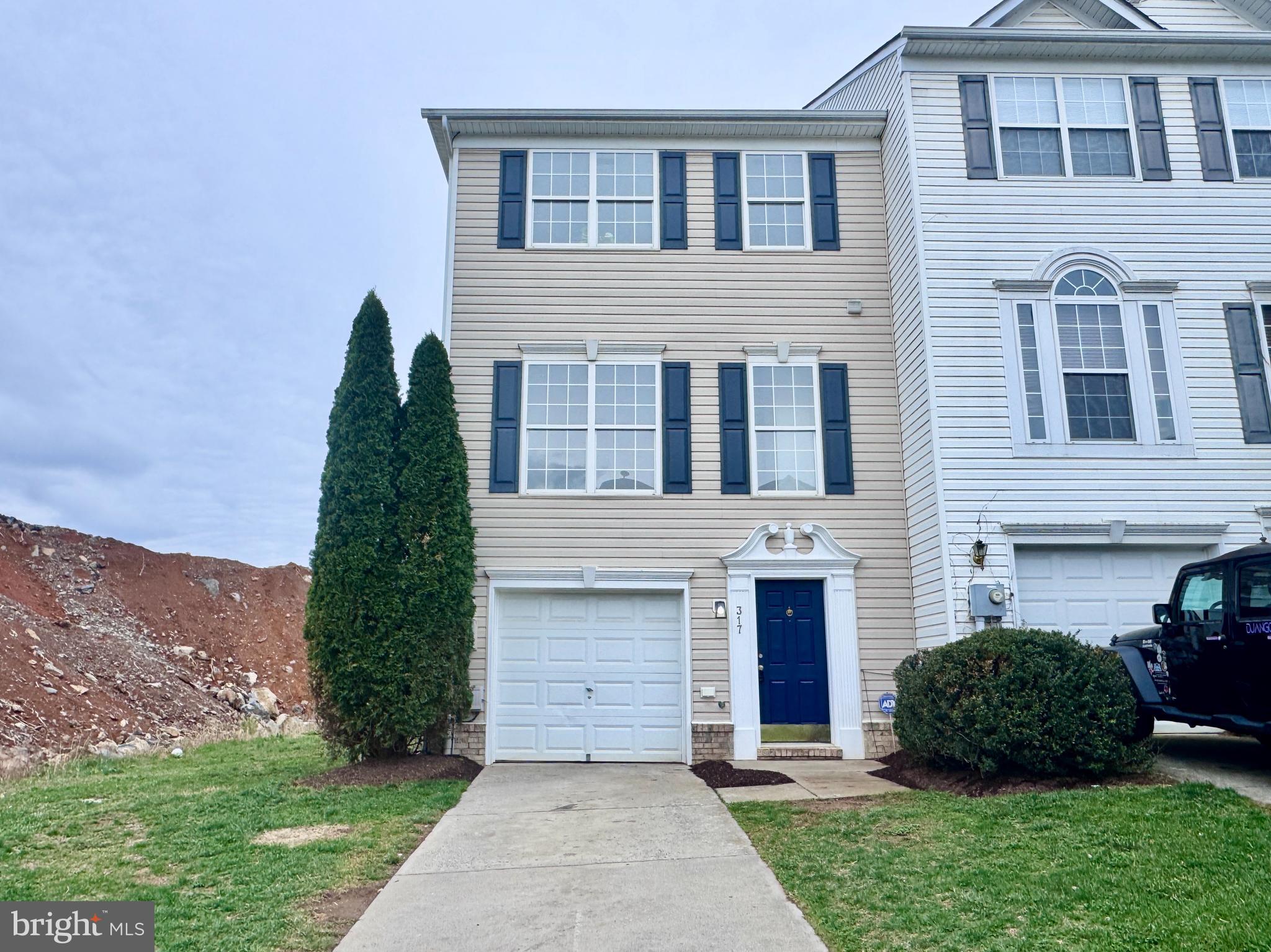 Welcome to 317 Bertelli Ct in Martinsburg!
Tucked at the edge of a growing new construction community, this spacious and light-filled home offers the perfect blend of established value and newer neighborhood appeal—without the wait or premium of building new.
Step inside to a clean, modern interior featuring fresh neutral tones, updated flooring in some areas, and an open, easy-flow layout designed for everyday living. The main level offers a living area with large windows, and seamless access to a dedicated dining space overlooking the backyard—perfect for both quiet mornings and entertaining.
Upstairs, you’ll find generously sized bedrooms, including a spacious primary suite with abundant natural light and an en-suite bath complete with soaking tub, separate shower, and dual vanity. Additional bedrooms offer flexibility for guests, home office space, or hobbies.
Enjoy the convenience of a one car attached garage, basement with additional living space including walk out basement, ample storage, and low-maintenance living, all positioned beside a developing community—giving you long-term upside and neighborhood growth.
Whether you're looking for your first home, more space, or a smart investment in a rapidly expanding area, 317 Bertelli Ct delivers comfort, value, and opportunity.
Convenient to commuter routes like I-81, shopping, including the nearby Commons, and everyday amenities all close by.