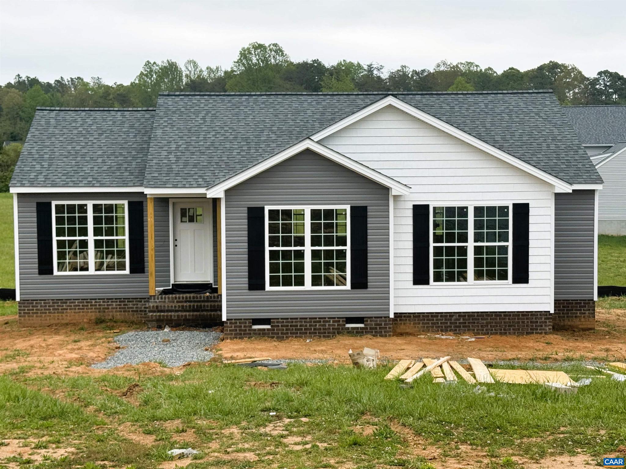 To Be Built in Louisa located 10 minutes to 64 and 250. STILL TIME TO MAKE SELECTIONS! This one level ranch home, sited on 3.73 acres, offers an open floor plan with laminate flooring, upgraded kitchen with Tier 2 kitchen cabinets, 36" wall cabinets with crown molding, stainless appliances, granite countertops, 2x8 island with overhang, extra LED lights in the great room, french doors leading to the 12x12 rear deck, primary bedroom with ceiling fan, primary bath with double bowl vanity and 5' shower, adult height toilets, LED lights in the 2 additional bedrooms, convenient laundry and pull down attic for storage. Craftsman style front door and shutters and black gutters for added curb appeal.  Ask how you can receive $7,500 in Seller Paid Closing Costs.  Photos are of a similar Leesburg model.,Granite Counter,Wood Cabinets