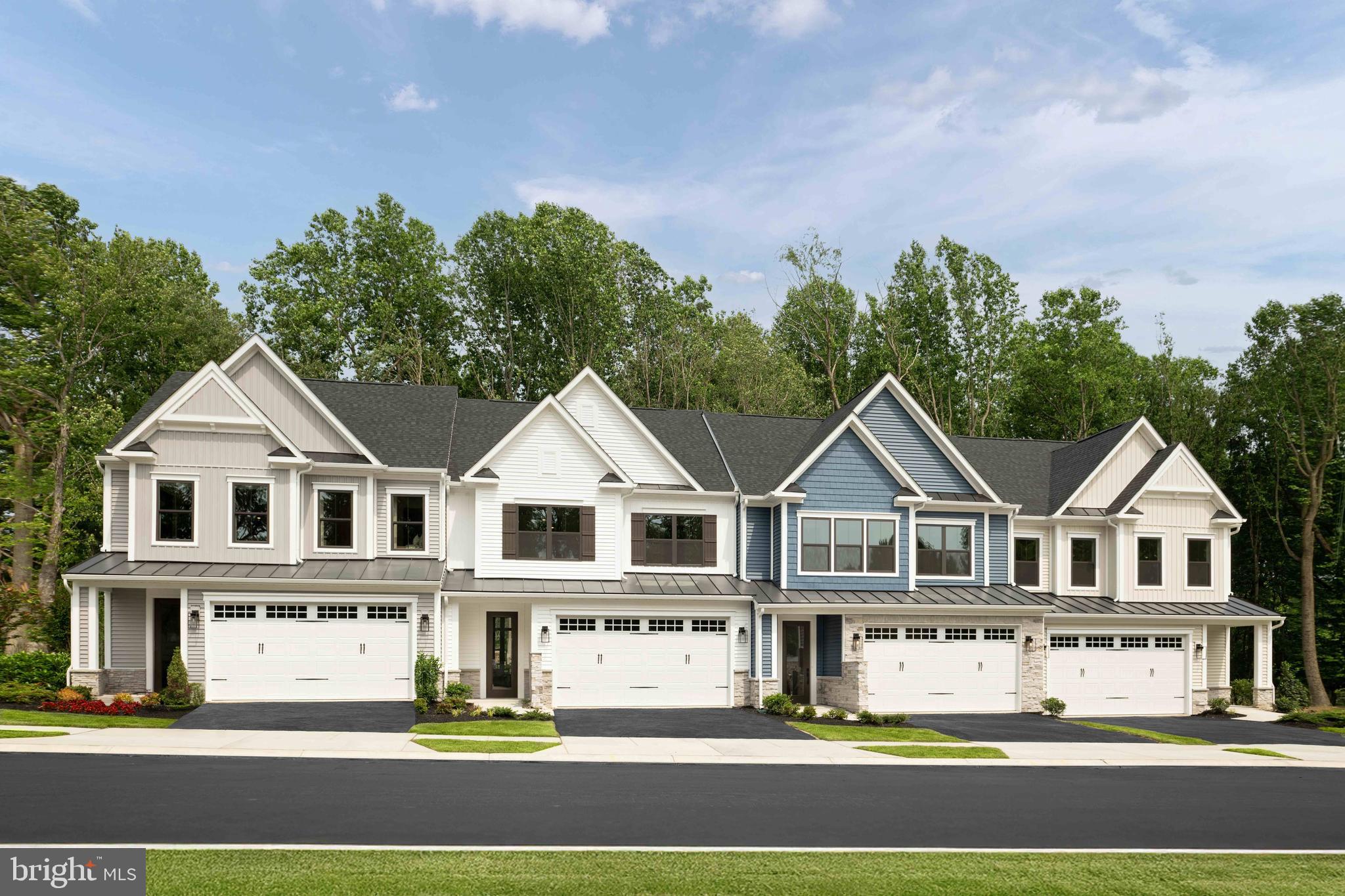 Experience elevated 55+ living at NVHomes Bethany Glen in Ellicott City. The Lowell Villa offers an exceptional blend of luxury and convenience, set within an intimate wooded enclave. This main‑level residence showcases a stunning open layout with a gourmet kitchen, oversized island, and seamless flow into the dining area and great room, highlighted by soaring 12' ceilings and abundant natural light. A covered rear porch extends your living space into the tranquil, tree‑lined surroundings. The private main‑level owner’s suite features a generous walk‑in closet and a spa‑inspired bath with dual vanities, creating a serene retreat. The upper level provides a second Owner's Suite with walk in closet and en suite bath and an elegant guest sanctuary with two spacious bedrooms, a full bath, and an airy loft ideal for relaxation or hobbies. A 2‑car garage, refined arrival center, powder room, and dedicated laundry space enhance everyday comfort. A large, finished basement offers additional space for entertaining. Community amenities include gym, pickle ball courts, game room, and communal space. Discover low‑maintenance luxury living in one of Ellicott City’s most desirable 55+ communities.