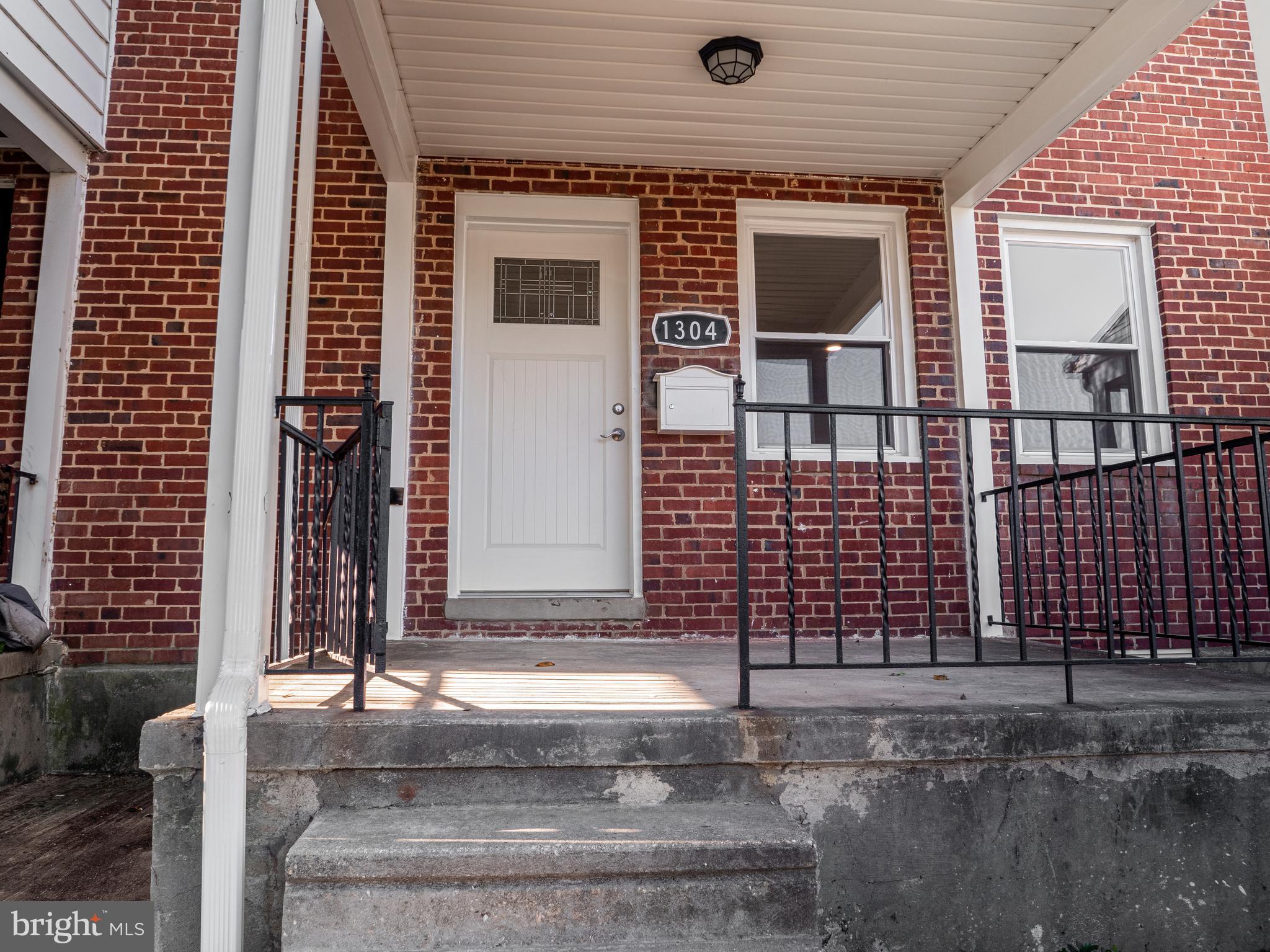Beautiful, fully renovated townhome!  Gleaming refinished hardwoods throughout, new kitchen with granite counters, breakfast bar, stainless steel appliances, updated everything,  Remodeled bathrooms on upper and lower levels, and plenty of additional living space on lower level including a recreation area and a room that could be used for office, guest room, etc. Kitchen walks out to a comfortable deck which opens to a large flat back yard. Come today and make this HOME!