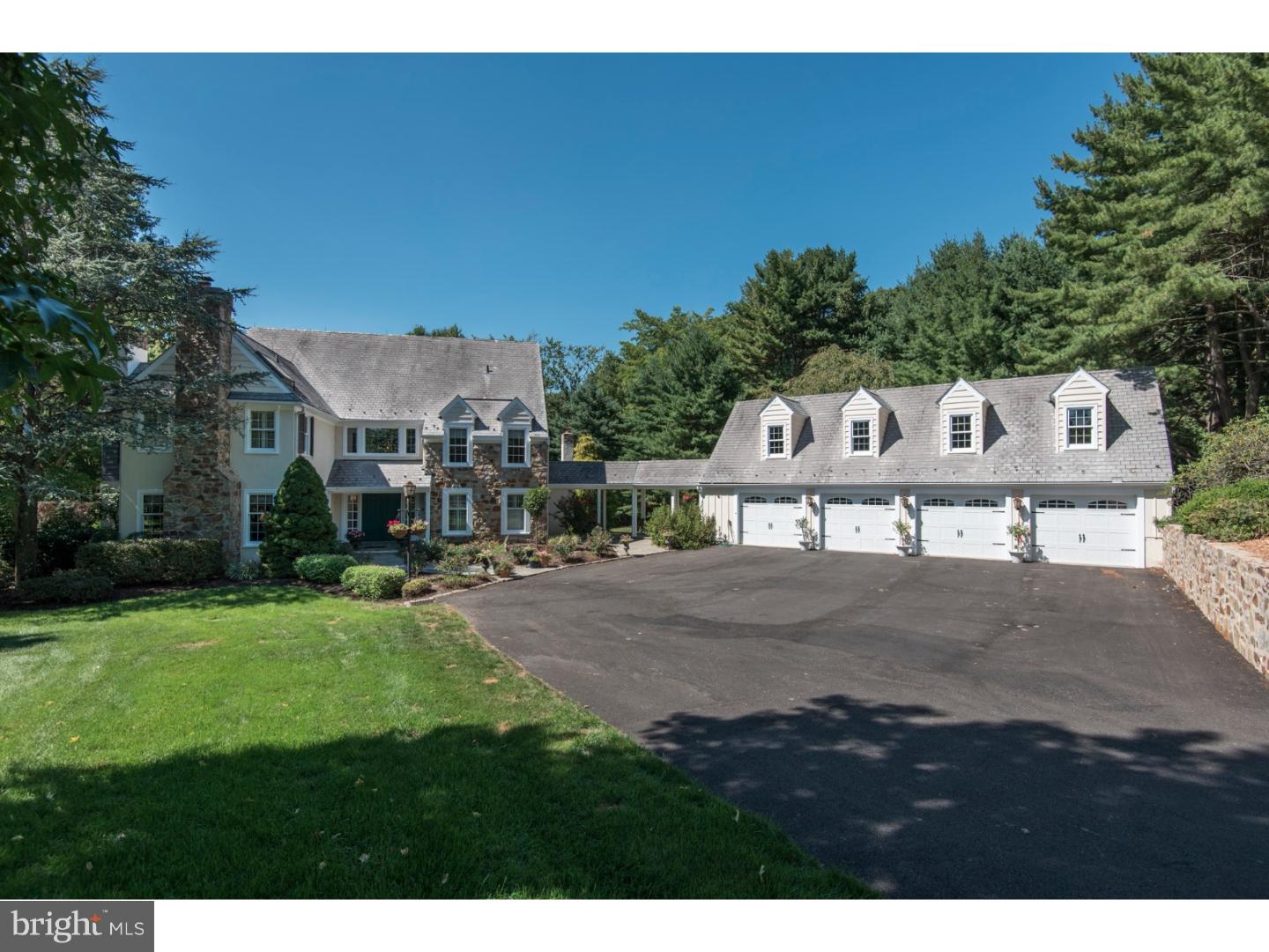 Rare is the home that owes its original and unique design to the iconic Ann Capron, then blends in today's lifestyle upgrades, and has the land and the privacy so difficult to find at any price, in any location.  1225 Heather Knoll Lane in Media, is such a place, and captures the uniqueness of a beautiful structure while offering a visually, texturally and functionally welcoming home.  Mixing a variety of materials and exceptional craftsmanship, the home's generous proportions lend a surprising intimacy matched by the privacy of the acreage.  The particulars:  The interior dimensions vary by source: apx. 5,000 sq. ft., with between 4-5 bedrooms based on use, and 4 full and one to three half baths (the last, a Jack-and-Jill configuration), with 9' ceilings throughout. A unique Farmhouse/Colonial style, a 2-story center hall with a handmade floor is at the entry, beyond which are a Powder Rm, Study, Dining Rm, Living Rm, Breakfast rm and Kitchen with high-end appliances, and the appropriately named Great Room, with a fireplace that encompasses an entire wall. A mudroom, laundry rm, and 3-season Sun porch finish the first floor.  A grand staircase takes you to the second floor where three of the bedrooms are located, each en suite. The Main Bedroom Suite is simply incomparable, sparkling with daytime sunlight, and in the evening, casts a glow from the fireplace; the private Bath is simply beyond description and rivals the best ever seen.  The closet in the main bedroom takes "walk-in closets" to a whole new level, with closets within the closet, and a private deck.  Each of the two additional bedrooms upstairs are lovely and light-filled, and have their own full bath.  The lower level is a walk-out, fully finished with a spacious recreation room with fireplace, a bedroom or two, and a Jack-and-Jill bath. The Sun porch overlooks the expansive multi-level slate and Brazilian Ipe wood decks, with entertainment areas that accommodate over a hundred people, and overlook the lush professionally landscaped grounds with breathtaking views of the enchanting pond, fountain and gazebo.  The car enthusiast will be thrilled with the detached 4-bay garage with powder rm, and the artist or in-laws can secret themselves away in the massive 2nd floor of the garage, waiting to be finished.  The story of this enchanting home is still being written.  Whatever your lifestyle, whatever your story, 1225 Heather Knoll will help you create the next chapters of yours.