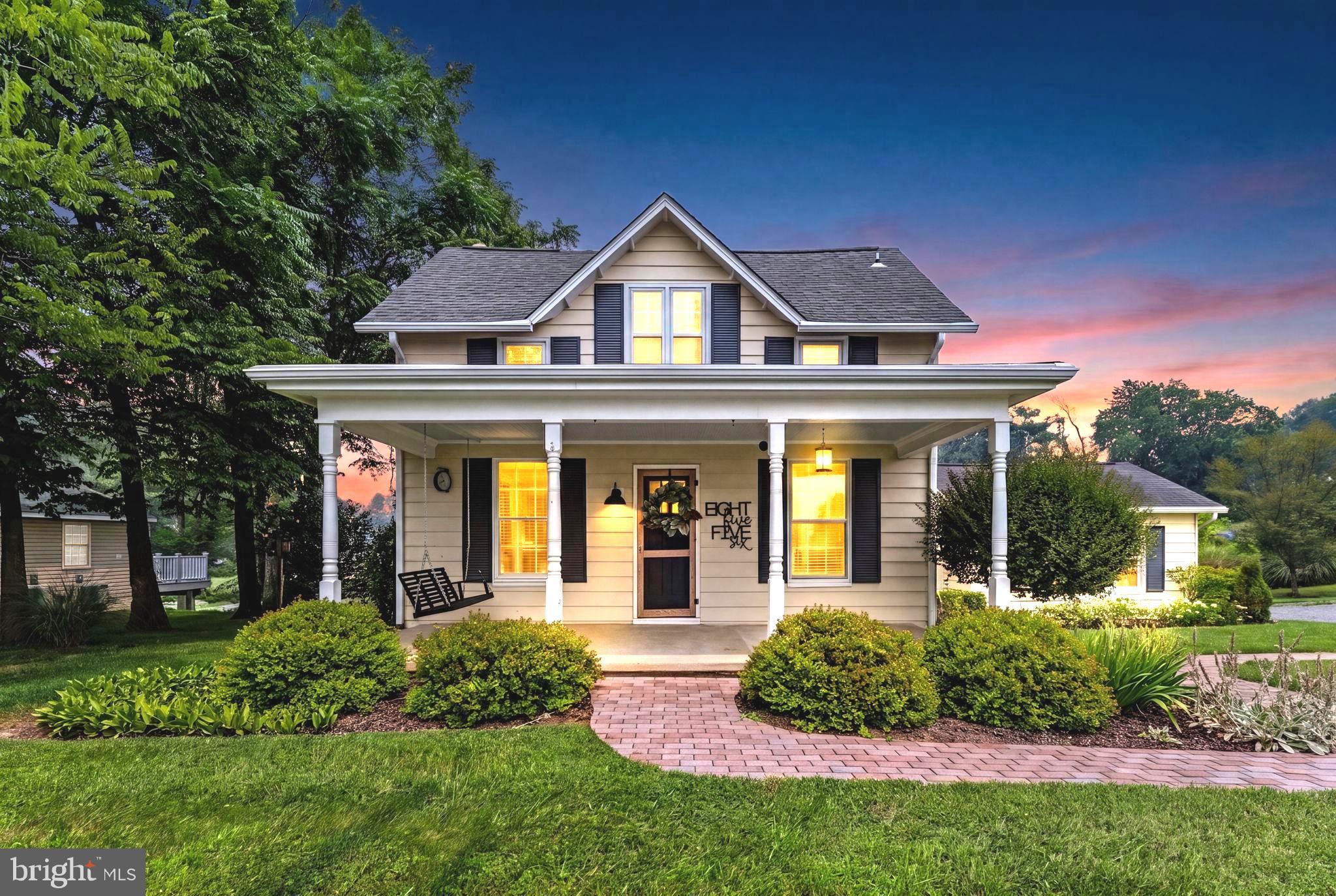 Welcome home to the charm and beauty of Fauquier County. Nestled on nearly an acre along scenic Opal Road, this beautifully renovated farmhouse perfectly blends timeless character with thoughtful modern updates. From the moment you arrive, you'll appreciate the warmth, craftsmanship, and pride of ownership that can be felt throughout this inviting home.

The home offers flexible living arrangements with three bedrooms on the upper level and an additional guest bedroom or office on the main level.  The home has been extensively renovated, updated, and improved throughout, creating a move-in ready home for buyers who appreciate a classic farmhouse character with today's modern comforts.

The heart of the home is the beautifully updated kitchen, thoughtfully modernized with stylish finishes, making it the perfect space for preparing family meals or entertaining guests. Rich architectural details throughout the home including beautiful exposed interior brickwork add warmth, texture, and timeless appeal. The inviting fireplace creates a cozy focal point, making the living area an ideal place to gather with family and friends throughout every season.

Step outside and enjoy the peaceful backyard providing privacy, scenic countryside views, and plenty of room to relax, entertain, garden, or simply enjoy the tranquility of rural Virginia.
A standout feature is the large detached garage, offering outstanding flexibility for multiple vehicles, a workshop, hobby space, additional storage, or recreational equipment.

Despite its peaceful country setting, the property offers outstanding convenience. Historic Old Town Warrenton is only approximately 12–15 minutes away, where you'll enjoy charming boutiques, locally owned restaurants, breweries, coffee shops, and year-round community events. Downtown Culpeper is also just 20–25 minutes away, providing additional shopping, dining, and everyday conveniences.

If you've been searching for a home that offers classic Virginia charm, beautiful craftsmanship, scenic views, and the perfect balance of country living with convenient access to town, 8556 Opal Road is ready to welcome you home.