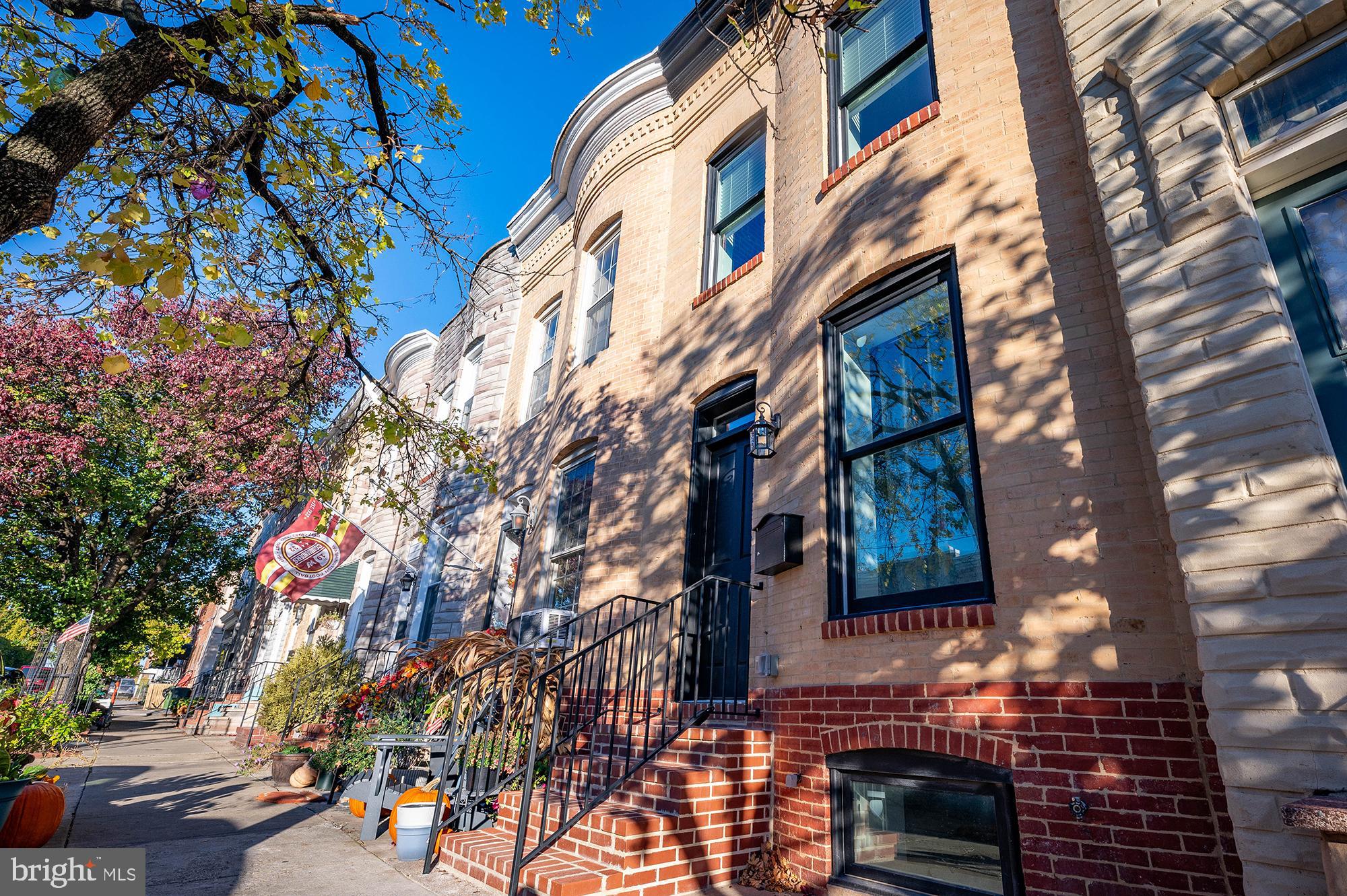 Welcome to 1417 Decatur St – a gorgeous home ready for its new owners offering CHAP tax credit (pending) based on $180,000 pre-renovation appraised value. The inviting living and dining room impresses with high ceilings, natural light, an exposed brick accent wall, and beautiful blond floors, creating an elegant yet inviting atmosphere.

Flowing seamlessly from this space is a beautifully designed kitchen featuring classic shaker wood cabinets, crisp quartz countertops, and an eat-in island, perfect for casual meals and entertaining.

The second level includes two spacious bedrooms and two luxurious bathrooms. The primary suite impresses with tall ceilings and large windows that fill the space with light. Its stunning en-suite bathroom features a custom walk-in shower and a separate tub for ultimate relaxation. The second bedroom is bright and airy with ample windows, while the hallway bath showcases timeless black and white tile.

The lower fully finished level offers sleek LVP flooring  and an additional full bath, creating a comfortable and stylish space perfect for guests or additional living areas. This stunning, brand-new rebuild features all-new systems for worry-free living and modern comfort. Located in a prime spot of Locust Point, where you're just steps away from local dining and shopping, offering the perfect blend of luxury and urban living.