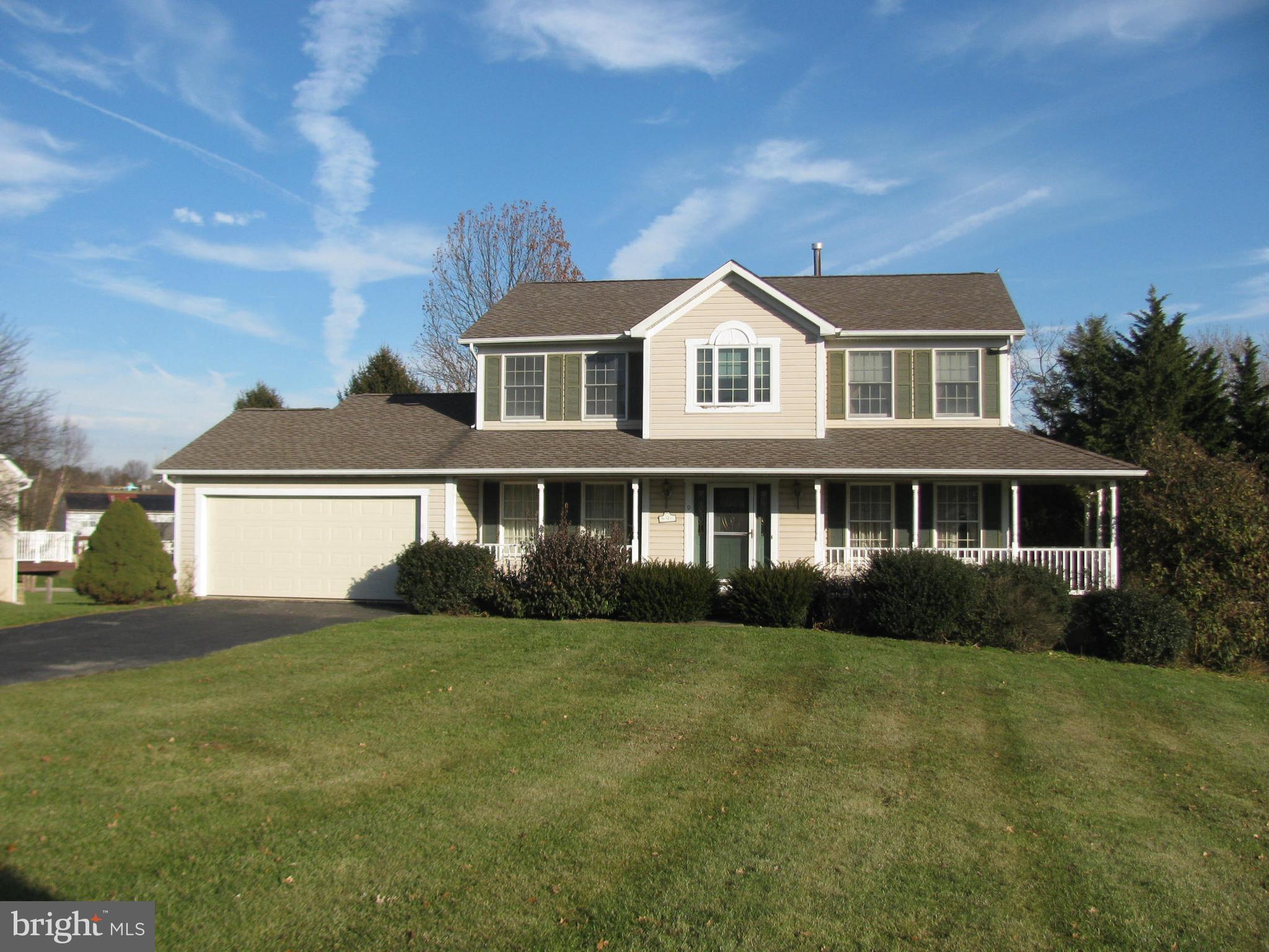 Spacious Colonial on half acre. Large Kitchen, Family Room, Formal living room with french doors and Formal Dining Room.  4 Bedrooms 2 and a half baths. 2 Car Garage. Level Lot with Mature Landscaping .  This home needs some elbow grease.  Priced to Sell. Seller will not make repairs sold as is.