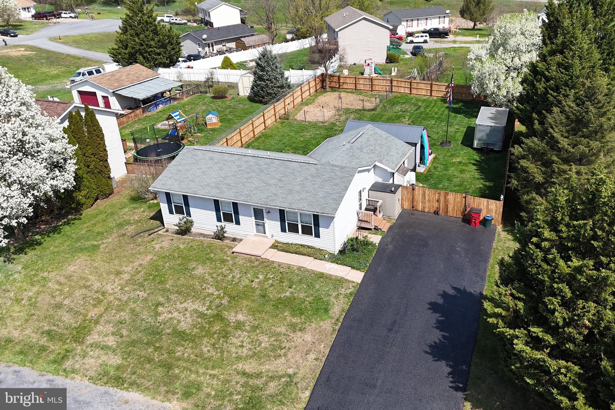 SEE VIDEO TOUR!!!  Ready for a stand-out property with plenty to offer?  You’ll love this 3-bedroom, 1 full bath 1,240 square foot rancher in the Nadenbousch Heights development.  Approaching the property, you’ll find a well -maintained “house -on-the-hill with a recently refinished driveway with room for 6 vehicles.  Entering the front door, you’ll be greeted by the living room area with LVP flooring and picture window overlooking the front yard area.  Adjacent is the eat-in kitchen with the continuation of LVP flooring, a full complement of appliances, a pass-through opening to the family room and sliding doors to the laundry closet.  Continuing is the welcoming sunken family room offering over 180 square feet of space including a gas fireplace behind an electric one as well as French doors leading to the patio area.  Heading down the hallway, you’ll find the continuation of LVP flooring leading to the full bath featuring a jetted tub and tile surround.  At the end of the hall is the primary bedroom featuring a walk-in closet.  Two additional bedrooms are also found each with sliding closet doors.  Back out to the family room and through the French doors is the rear patio area with a fully fenced back yard area, garden, fire pit and storage shed.  1 hour notice for showings, M-F, after 5:30pm, anytime Sat or Sun.