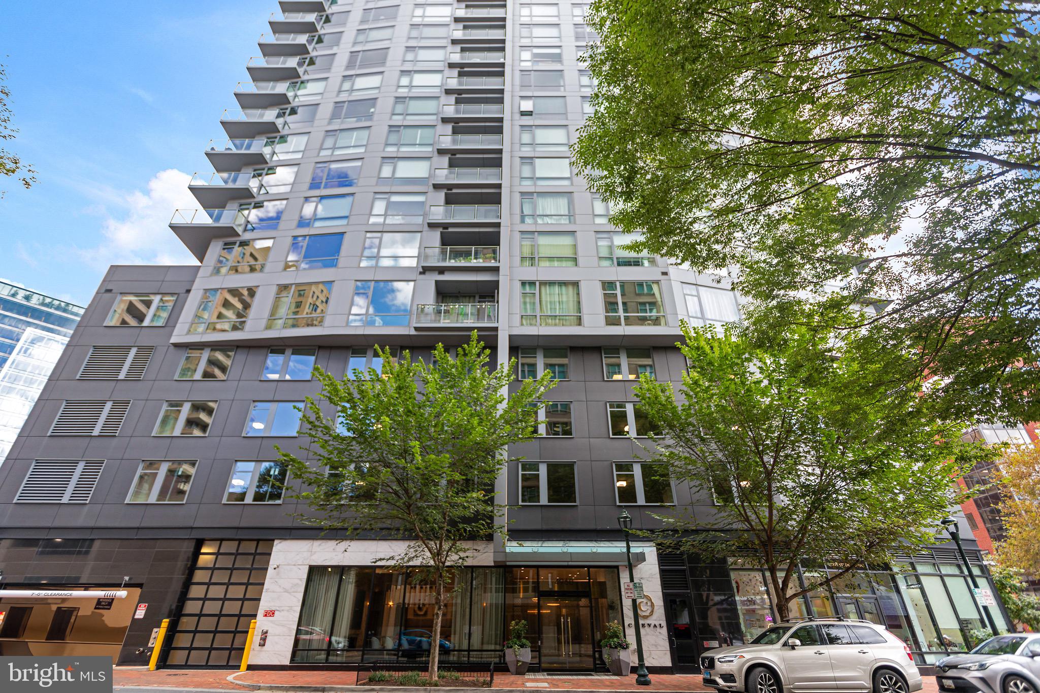 At the prestigious Cheval, this exceptional two-bedroom, two-and-a-half-bath plus den residence offers over 1,760 square feet of refined living with ​soaring nearly 9-foot ceilings and hardwood flooring throughout. It features floor-to-ceiling custom windows adorned with Lutron smart shades and custom drapery, beautifully framing breathtaking sunset views.
The gourmet kitchen is a striking blend of style and performance, featuring granite countertops and a spacious island with a breakfast bar, with a double-drawer refrigerator and wine cooler. A full suite of premium Thermador appliances—including a gas cooktop, dishwasher, counter-depth French door refrigerator with a bottom freezer and ice maker, and a combination wall oven, microwave, and wine fridge—delivers exceptional functionality and design. 
The grand primary suite offers generous closet space, including a walk-in closet with custom built-ins, and features a stunning primary bath with a separate glass-enclosed shower, dual vanity sinks, a soaking tub, elegant ceramic tile flooring, and a TOTO toilet.
Above-ground garage parking includes two dedicated spaces with EV charging capability and a designated storage unit in the basement. 
With on-site management and an intimate collection of just 71 residences across 17 floors. Cheval delivers a boutique lifestyle just moments from the Bethesda Metro, premier shops, dining, and everyday conveniences. Residents enjoy an exceptional suite of amenities, including 24-hour concierge service, an elegant lobby opening to a club room with fireplace, a state-of-the-art fitness center and yoga studio, and an expansive rooftop terrace with inviting seating and dining areas, an outdoor kitchen, and grilling stations—all set against breathtaking panoramic views