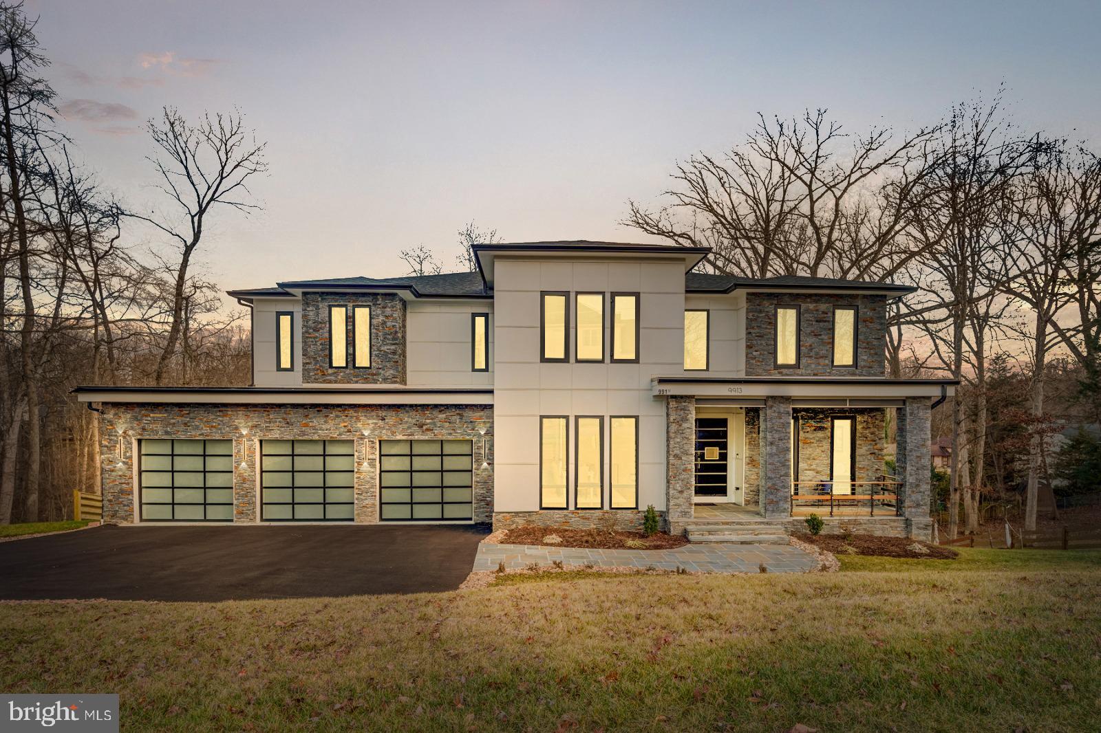 9913 Woodrow Street: A Modern-Craftsman Masterpiece. Step into the heart of Vienna and discover 9913 Woodrow Street—a residence that seamlessly melds the elegance of classic craftsman design with the clean sophistication of contemporary style. This 8,000 square feet home, replete with 6 bedrooms, 6.5 baths & 3 car garage is a sanctuary of space and luxury, promising a lifestyle that's both refined and functional.

The intersection of aesthetics and functionality transforms the living room into an idyllic space. Here, natural light graces the interior, illuminating the room's crown jewel: a grand stone wall with a gas fireplace that anchors the space. A large accordion door opens to the deck, inviting a continuous flow between the indoor elegance and the serene outdoor ambience.

Culinary dreams come true in the gourmet kitchen, a modern marvel with Viking and Z-Line appliances that cater to the demands of the discerning home chef. A two-toned island provides ample seating and serves as a centerpiece for the space, complemented by a butler's pantry that adds both convenience and charm.

Elegance abounds in the lavish dining room, bathed in the afternoon sun. With ample space for intimate family dinners or grand social gatherings, this room showcases the craft of entertainment at its finest.

The sprawling primary bedroom is a refuge reserved for relaxation. A cozy gas fireplace warms up the room, creating a haven that’s both inviting and tranquil. Adjoining the bedroom, a private patio beckons, providing an enchanting spot for quiet moments.

The en suite primary bathroom is a sensory oasis, offering not only a stand-alone jet tub and custom multi spout shower system, but also the warmth of heated floors—all bathed in the glow of natural light that pours through generous windows.

The entertainment possibilities are endless within the capacious lower level, featuring a media room, fitness room, and an all-purpose room for your leisure activities. Expecting guests? They'll feel right at home with a walkout patio, an expansive living and dining area complete with a kitchenette, and a private bedroom suite. The property is fully wired with CAT-6 fiber optics line along with security cameras and Wi-Fi repeaters on every floor. There is an opportunity to install an elevator for future convenience. 

Enhanced with unparalleled craftsmanship and an abundance of bespoke features, 9913 Woodrow Street is more than just a home; it's an expression of a life well-lived. With its breathtaking blend of modern convenience and timeless allure, this home stands as a testament to luxury and livability. It awaits the discerning buyer ready to embrace a lifestyle of grandeur in Vienna.