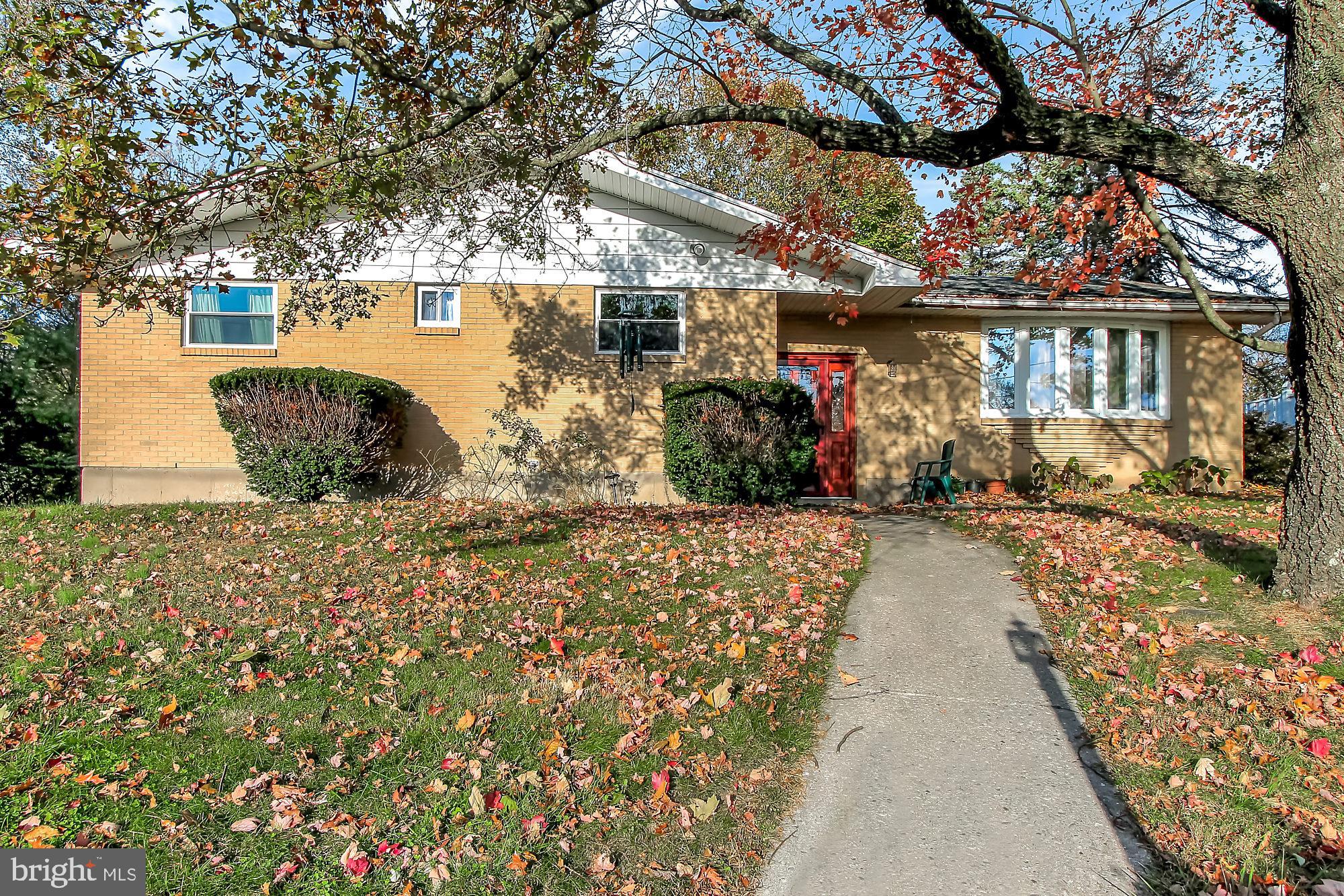 Plenty of room for the whole family in this beautiful four-bedroom home.   Solid and well-maintained, this is one to see!  With fresh paint, new windows, upgraded plumbing, new interior and exterior doors, upgraded kitchen and baths, there is nothing for you to do except unpack and settle in.  You will also appreciate the original hardwood floors, induction cook-top, central air, 2-car garage and spacious backyard.  The unfinished basement offers plenty of storage, and can be converted into extra living space.  This charming, all-brick ranch is in a great neighborhood and won't last long.  Schedule your showing today.