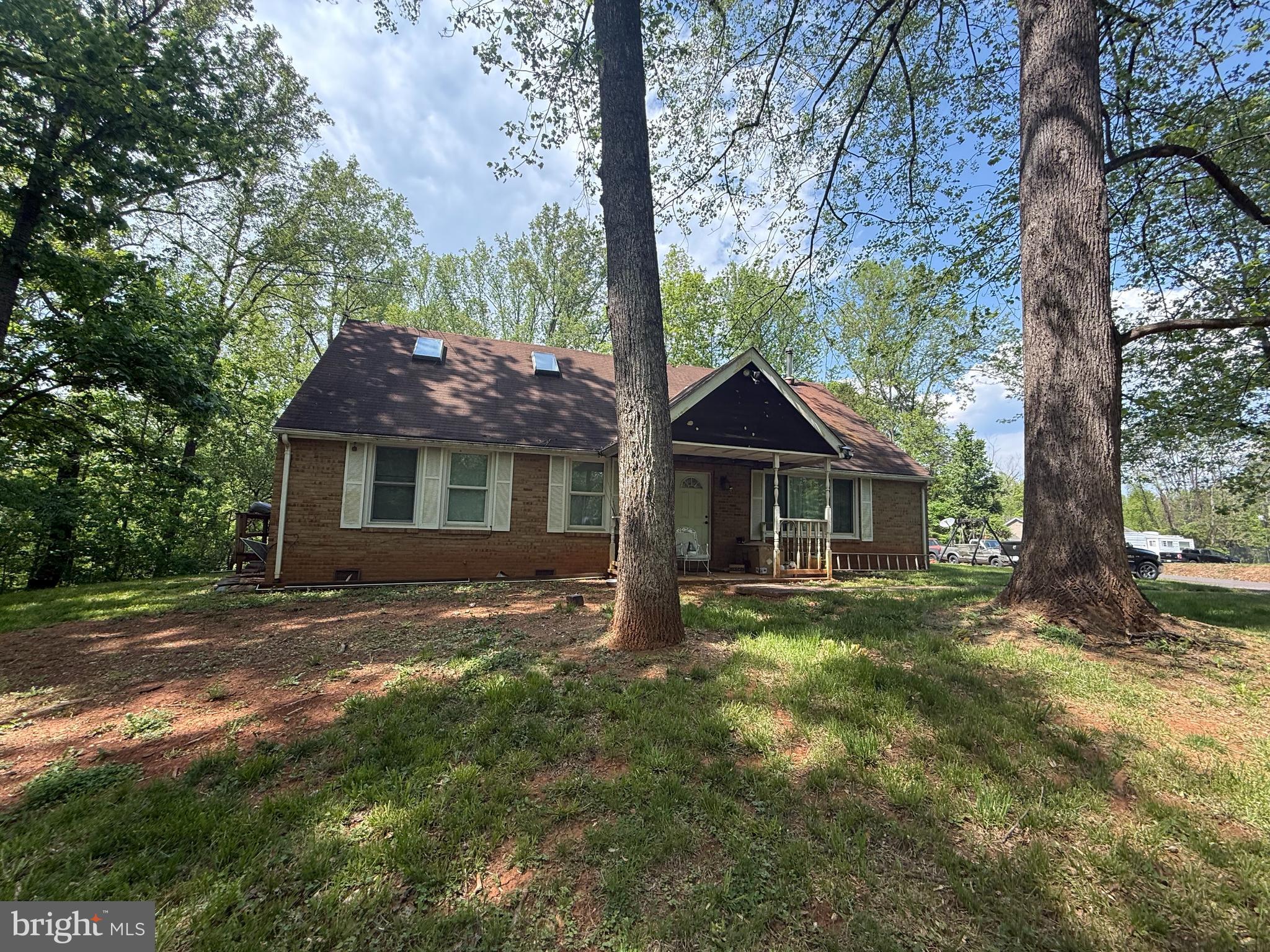 Professional photos coming soon! Private country setting with no HOA on 2.06 acres in Brandy Station. This 3-bedroom, 2-bath Cape Cod offers 1,680 finished square feet, a functional two-level layout, and a peaceful rural setting along Mount Zion Church Road. The property is being sold as-is and will need some repairs/updates, making it a strong opportunity for buyers seeking a renovation project, investment property, or value-add country retreat. Features include well and septic, driveway parking, A1 zoning, no subdivision restrictions, and convenient access to US-29, Culpeper, Warrenton, and surrounding commuter routes.