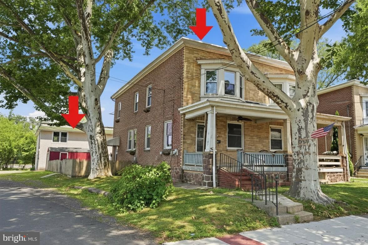 Rarely does a property offer this much versatility, income potential, and location all in one. Welcome to this exceptional corner-lot multi-family property in desirable North Coventry Township and the highly sought-after Owen J. Roberts School District.
Whether you're looking to owner-occupy while offsetting your mortgage, expand your investment portfolio with two income-producing residences, or create the perfect multi-generational living arrangement, this property offers endless possibilities.
The front residence is a charming three-bedroom, one-bath twin featuring beautiful hardwood floors, a welcoming front porch, full basement, fenced backyard, and storage shed. Behind the home sits a detached heated three-car garage topped by a spacious two-bedroom, one-bath apartment. As the only residential unit in the detached building, the apartment offers added privacy with no neighbors above or below. Separate utilities allow each residence to operate independently, maximizing flexibility for owners and tenants alike.
Parking is abundant with the heated three-car garage, generous off-street parking, and additional on-site parking for residents and guests.
The location is truly exceptional. Just steps from your backyard are pickleball and basketball courts, a baseball field, and a public boat ramp providing access to the Schuylkill River for kayaking, boating, and fishing. Enjoy easy walks to Riverfront Park and the scenic Schuylkill River Trail, or stroll just a few blocks into revitalized downtown Pottstown, where you'll find local shops, restaurants, outdoor dining, live entertainment, and community events. Commuters will appreciate quick access to Route 422 and nearby public transportation.
Properties offering this combination of two separately metered residences, exceptional garage space, abundant parking, recreational amenities, walkability, and a prime location within North Coventry Township and the Owen J. Roberts School District are incredibly rare. Whether you're an investor, homeowner, or looking for the ideal multi-generational setup, this unique property is ready to fit your lifestyle and financial goals.  Some photos digitally enhanced to remove spackle marks and to add arrows for building location. Sq. footage is approximate.  Property has been maintained with renters recently vacating.  Property is being sold AS IS. Buyer has the right to conduct inspections at Buyer's expense for informational purposes only.  Seller will make no repairs, replacements or concessions based on inspection findings.