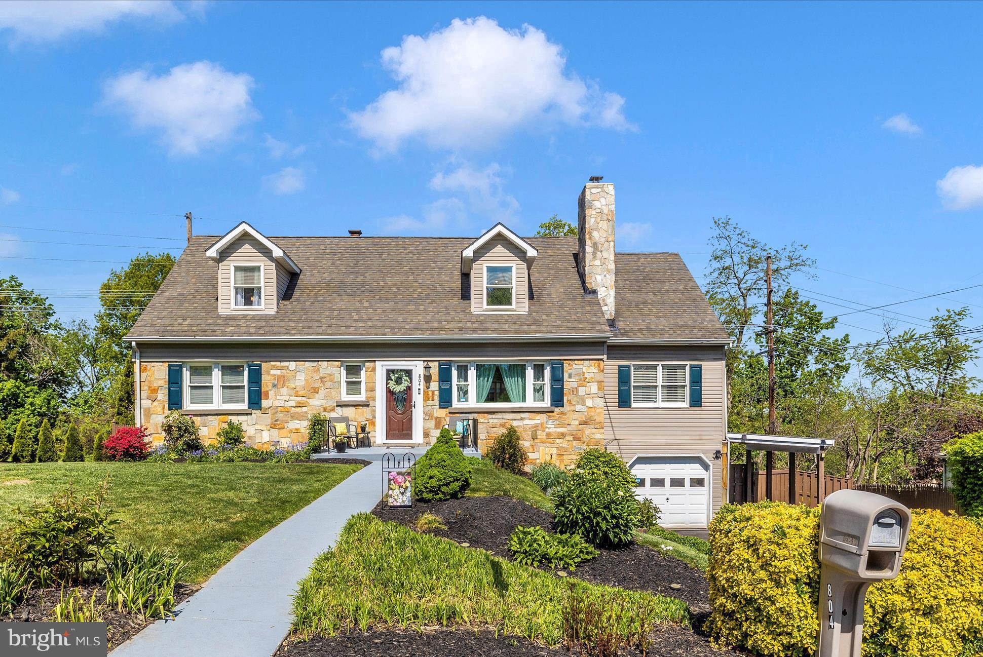 Meticulous & Stunning, this Unique Cape Cod is certain to WOW!! you, all the way through. Formal Living room with (capped) Fireplace, Hardwood Flooring and Vinyl Clad (2024) Front Picture Window; Custom Kitchen w/Specialized Cabinets (eg soft close, pull out drawers, built in pantry), Stainless Appliances, Quartz Counters & Ceramic Flooring; Family Room off Kitchen with Breakfast Area, a Stone Wall and Wood Floors; Dining & Sitting Room along the rear with Pantry/Coat/Storage Closet, Wood Floors & Exit to rear yard. Double Sized Primary Bedroom w/2 Closets, Full Bath and 2nd Main Level Bedroom or Den. Three Bedrooms on the Upper Level and 1 Full Bath. 2 of the 3 bedrooms have Walk in Closets, and 1 Bedroom has the direct access to a huge attic storage area. This upper addition was completed in 2002. The lower level has been recently refinished and features a Recreation Room with a Brick walled wood-burning fireplace & Ceramic flooring, a Mudroom with walk-in closet where you enter from garage, a laundry room with washer ('22), dryer ('24) and laundry tub, along with a utility area/room.  The backyard is fenced and features an open patio (looks perfect to set up a small firepit!) a covered back porch and sectioned deck. Hot Tub (two years  young!) conveys!! Check out the documents and disclosures for more detailed information on this lovely home!