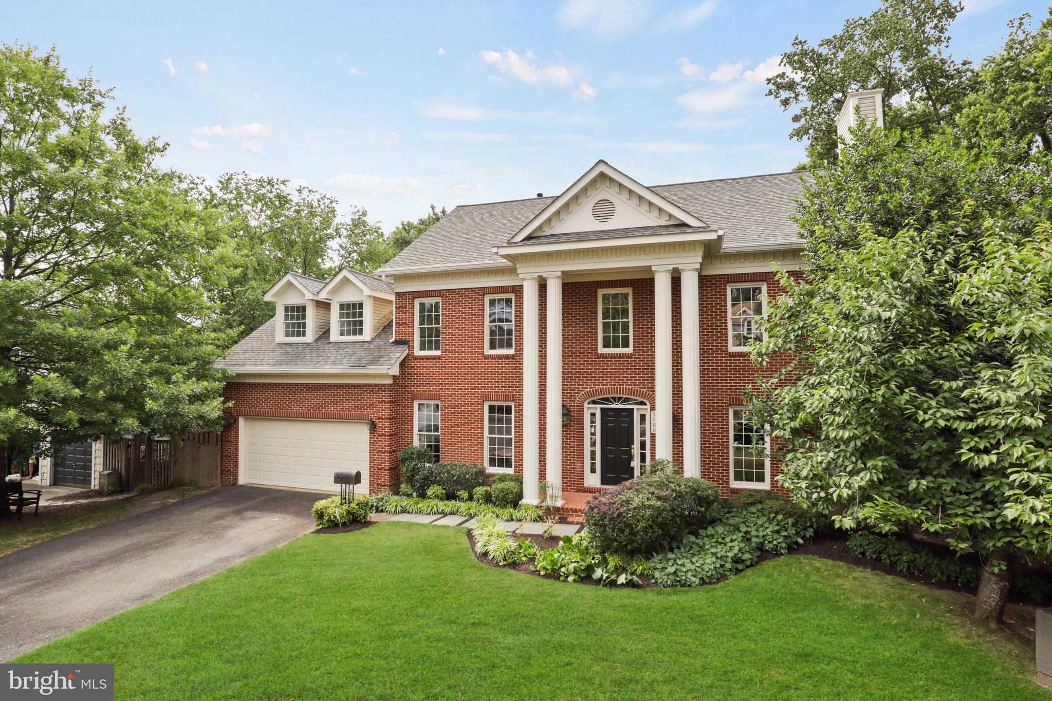 You will love this one! Grand 4 bed/3.5 bath brick colonial perfectly situated between Ballston and Westover, tucked away in a small enclave of homes on a cul-de-sac—a rare find in Arlington!  Newer roof (2018) and air-scrubber purifier (2021).  Attached 2-car garage with kitchen entry and convenient access to laundry.  Dramatic center-hall entry with vaulted ceiling and beautiful marble tile.  Newly painted throughout, gleaming hardwoods (main-level and primary suite) and airy 9-foot ceilings.  New carpet in 3 additional upper level bedrooms.
Spacious traditional floor plan lends to comfortable living—just feels like home with many options including bright home-office with built in cabinets and shelving, formal living room with wood burning fireplace and floor to ceiling windows.  Welcoming, spacious gourmet kitchen with center-island and  stainless steel appliances, eat-in space that transitions to large sunny family room.  From here step out to gorgeous outdoor living—professionally landscaped yard and outdoor kitchen just in time for summer cookouts.  
Of note is the elegant formal dining room with detailed millwork perfect for entertaining many guests.  Upper level with grand primary suite, office nook and 2 generous walk-in closets, spacious bathroom with jacuzzi soaking tub.  Additional 3 bedrooms with shared hall bath.  Lower level includes an ample recreation room, wet bar, wine cellar, full bath and large additional unfinished space for storage or future office, bedroom or game room.  
Blocks from Westover eateries and shops, quick access to Bon Air Park and Rose Garden, Arlington Forest Club (swim & tennis) and Bluemont Park. Paved bike trail to Ballston Metro, Ballston Quarter shops and restaurants.  Easy commute and public transportation to DC, National Airport, Pentagon, Amazon HQ2, Tysons.  Quick access to Wilson Blvd, Rte 50, I-66.  A gem in one of Arlington’s top-ranked neighborhoods and school tiers.