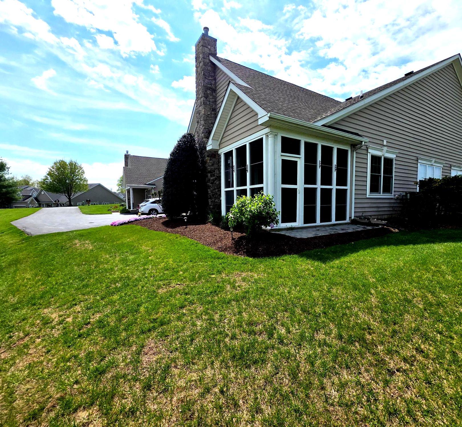 Welcome to this beautiful end-unit townhome in the desirable 55+ Villages of Hillview community. This spacious 3-bedroom, 3-bath home offers the ease of one-floor living with additional flexible space upstairs.

The main level features an open living room with a cozy gas fireplace that flows into a screened-in porch—perfect for enjoying your morning coffee or relaxing in the evening. A formal dining room provides plenty of space for family gatherings and entertaining.

The updated kitchen includes granite countertops, a gas stove, and a bright breakfast area. The first-floor primary suite features a tray ceiling, two walk-in closets, and a private bathroom with a soaking tub and a walk-in shower.

Upstairs, you'll find a private third bedroom with a full bath, a built-in closet, and a barn door for added privacy, making it an ideal guest suite, home office, or hobby room.

Additional updates include a new HVAC system (2019) and water heater (2022). The two-car garage offers built-in shelving for extra storage.

Enjoy the privacy of an end-unit home along with low-maintenance living and wonderful community amenities. Conveniently located near shopping, dining, and major routes.

Now offered at a fantastic new price—don't miss the opportunity to make this beautiful home yours!