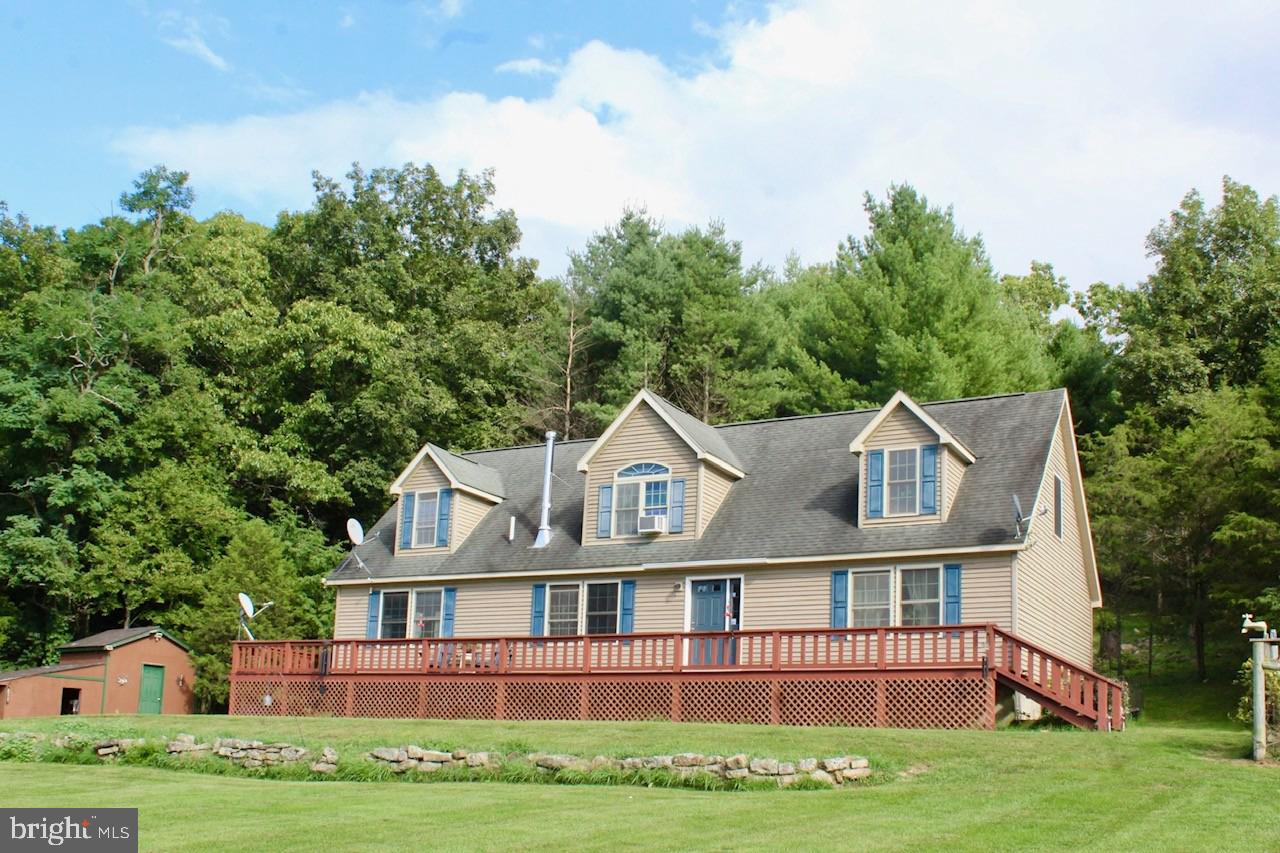 Enjoy your own Mountain Retreat situated three parcels totaling over 17 acres.  Views in every direction with the gentle Blackthorn Creek (which is home to Native Brook Trout) running the lower perimeter of the property. There is extensive fencing with walking paths throughout the fields, where you can pick from your berry bushes, as well as fruit and nut bearing trees. Enjoy the ample garden space for growing your own produce and canning for the year. The retreat is adorned by multiple buildings and a creek-side getaway.  Birdwatchers and wildlife enthusiasts will not be disappointed! There is so much to see and to enjoy, all from the comfort of home.  High speed internet is available and will support working remotely.