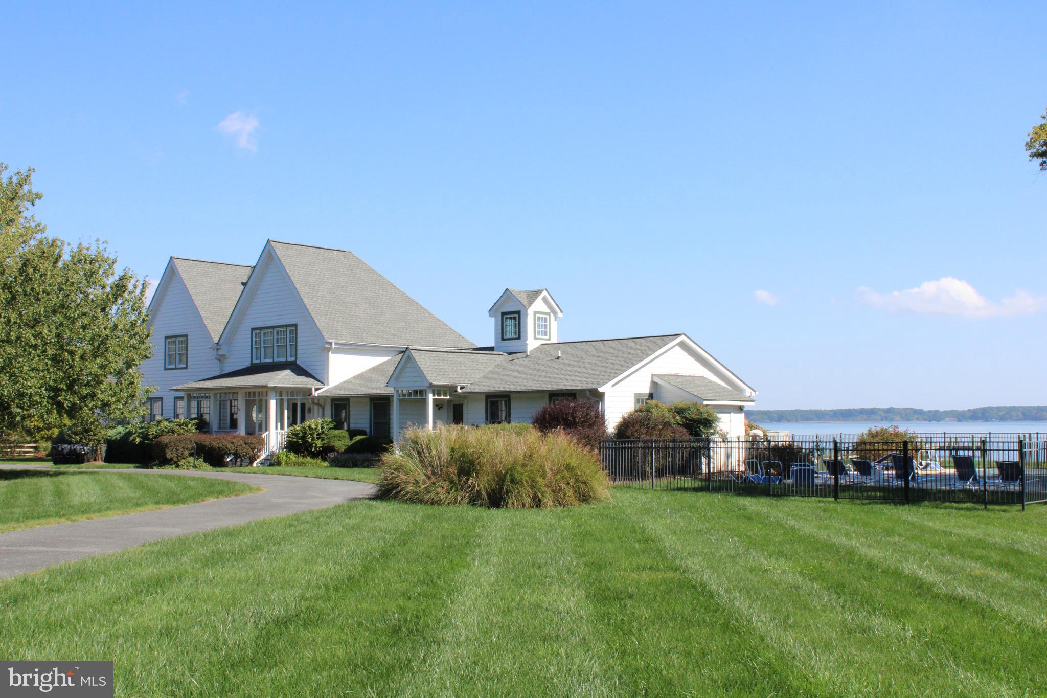 GENEROUS PRICE REDUCTION!!!! This remarkable property has it all. Private 15 plus acres. Beautiful views overlooking Dunn's Cove sunrises. A shore sportsman's dream. Partially wooded, fields of crops, hunting blind and a pier for your fishing vessel. This was a large compound with the Main house, in-law wing and a separate 2 BR guest house w/fireplace and large screened porch. Waterside in-ground pool and children's play area.  Large garage/barn to store all the water toys and pool equipment. It's currently being used as a Vacation Rental. Showings will be staggered between use.