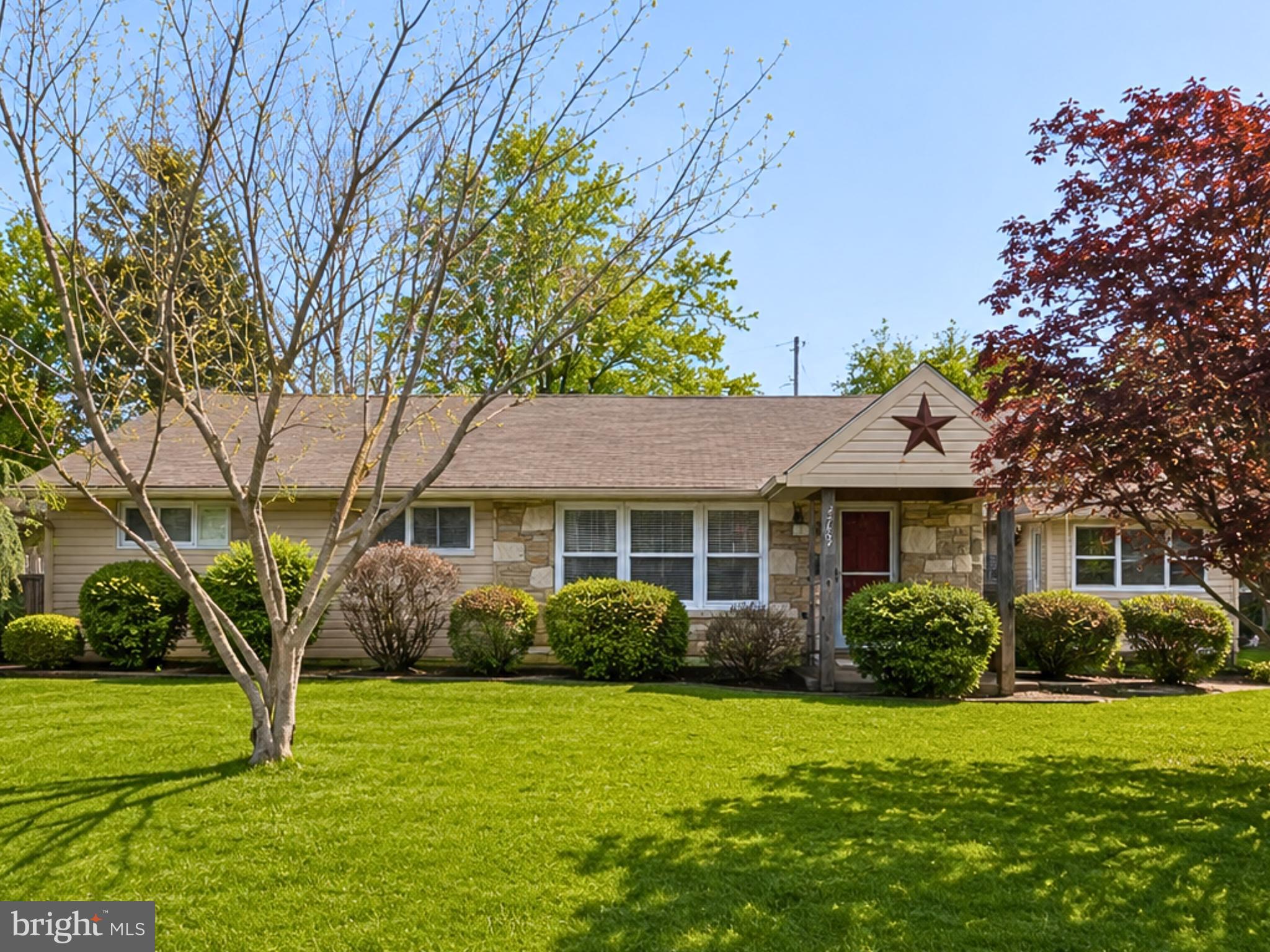 This beautifully expanded and updated ranch home is a rare opportunity to own a property on a large corner lot perfectly positioned in Roslyn’s highly desirable neighborhood directly across from Roslyn Park. Enjoy being just steps from baseball fields, playgrounds, walking trails, the Roslyn Boys & Girls Club, Marsden Soccer Field, basketball courts, and the popular skatepark, while also only a 5-minute walk to Roslyn Elementary School and a 5-minute drive to Roslyn Train Station for easy commuting.

Set on a beautifully landscaped corner lot with mature perennial gardens and excellent outdoor space, this move-right-in home offers exceptional curb appeal, abundant natural light, updated flooring, extensive trim work, and plenty of storage throughout. From the thoughtful updates and flexible layout to the unbeatable neighborhood amenities and top-rated schools, this is the type of home buyers wait for in Abington Township.

The spacious living and dining areas create a warm and inviting atmosphere featuring a cozy wood-burning stove and French doors leading to a covered paver patio perfect for entertaining, outdoor dining, or relaxing evenings at home. The kitchen offers generous counter space, abundant cabinetry, newer appliances, and easy access to the mudroom and oversized laundry area for added convenience.

Bedrooms are generously sized  including an expanded primary closet and an updated bathroom with tasteful finishes. Offering comfort, functionality, and an exceptional location, this home perfectly combines suburban charm with an active community lifestyle.