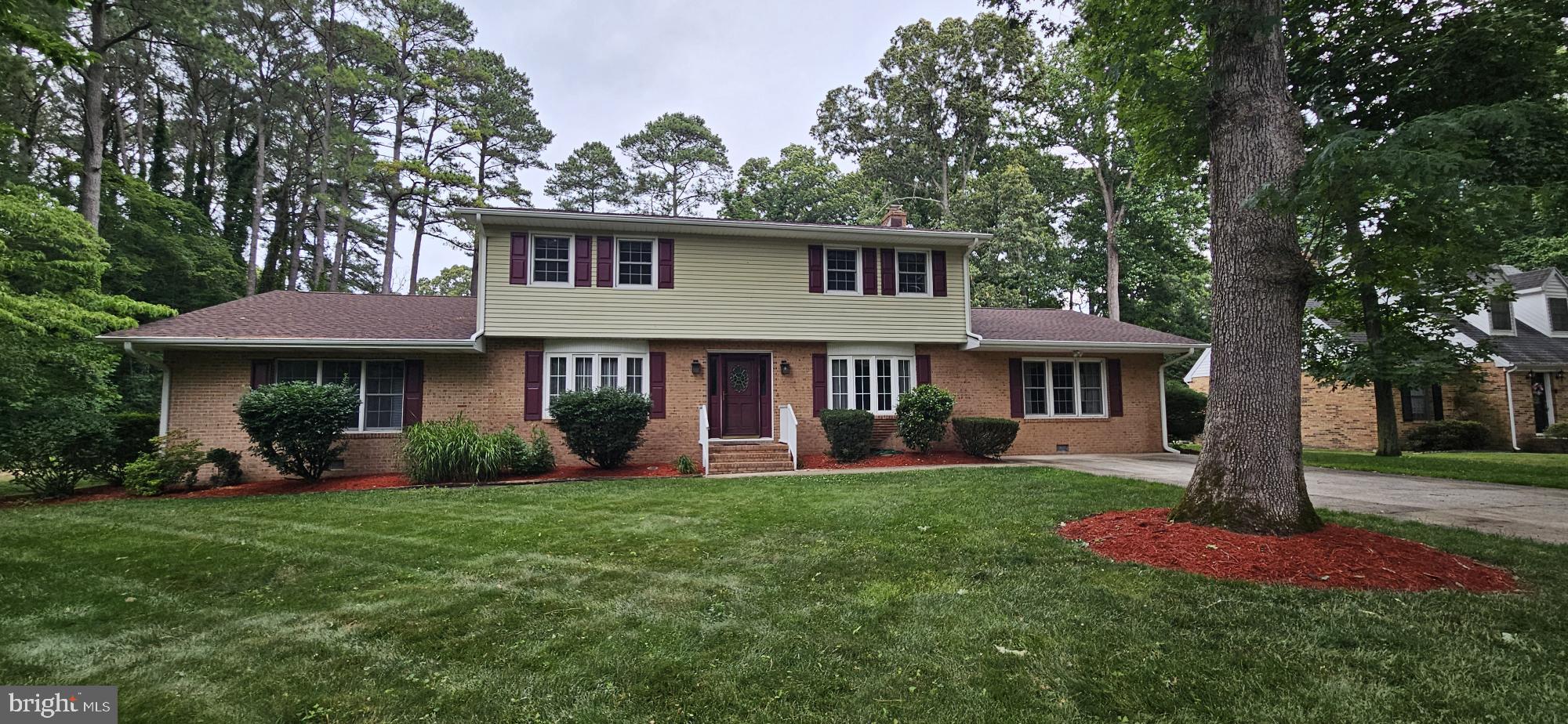 Offered for the first time since it was built in 1972, this classic colonial in Avalon Park presents a rare opportunity to own a beautifully maintained home in one of Salisbury's most established and desirable neighborhoods. With over 4,200 square feet, 4 bedrooms, 3.5 baths, and a flexible bonus room that could easily serve as a fifth bedroom, this home has been thoughtfully cared for by the same family for more than five decades. Designed for comfortable everyday living and entertaining alike, the open kitchen features granite countertops, a separate pantry, and an adjacent utility closet, providing exceptional storage and organization. The kitchen flows seamlessly into the main living areas, while the expansive sunroom stands out as the home's signature feature, offering abundant natural light and beautiful views of the landscaped backyard. Uniquely suited for a variety of living arrangements, the home features owner's suites on both the first and second floors, providing exceptional flexibility for guests, multigenerational living, or changing needs over time. Storage is abundant throughout the home, including generous bedroom closets and a large storage closet off the laundry room, which is equipped with a utility sink for added convenience. Outside, the fully fenced rear yard creates a private retreat centered around an 18' x 36' in-ground pool with a recently replaced liner, perfect for summer gatherings and outdoor enjoyment. Two detached storage sheds provide additional space for hobbies, equipment, and seasonal items, including one shed with electricity. Located in North Salisbury, Avalon Park remains a favorite among local buyers for its mature setting and convenient access to shopping, dining, healthcare, and everyday amenities, while Delaware's tax-free shopping is just a short drive away. Adding further peace of mind, the septic system was recently evaluated by Blue Wave Environmental, with all recommended repairs completed. Combining timeless colonial character, exceptional space, versatile living options, outstanding storage, and a prime location, this distinctive home is ready for its next chapter.