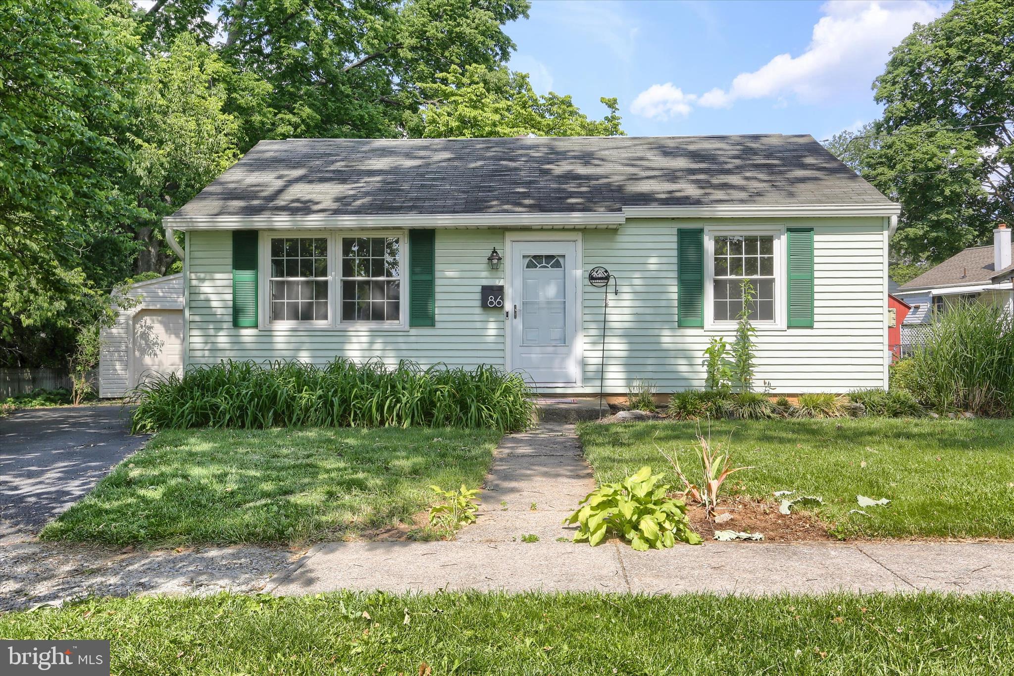 This ranch home is located in Camp Hill (West Shore School District) and is ideal as a starter home or could be perfect for those looking for a smaller living space and less maintenance.  It is situated at the end of a quiet road in the neighborhood. It features 2 bedrooms and 1 full bathroom with a jacuzzi style tub, a living room and an eat-in kitchen with granite countertops/backsplash with access to a back patio for grilling and relaxing.  A level backyard, a paved driveway large enough for 2 cars, an oversized workshop/storage garage (with new roof) and a garden shed. The home is move-in ready.  Refrigerator, washer and dryer convey. It also has gas heat and a gas stove.  Extra storage space in the attic.  Great location!  It is just minutes away from shopping and many restaurants plus easy access to highways.  Come visit and make this home yours!