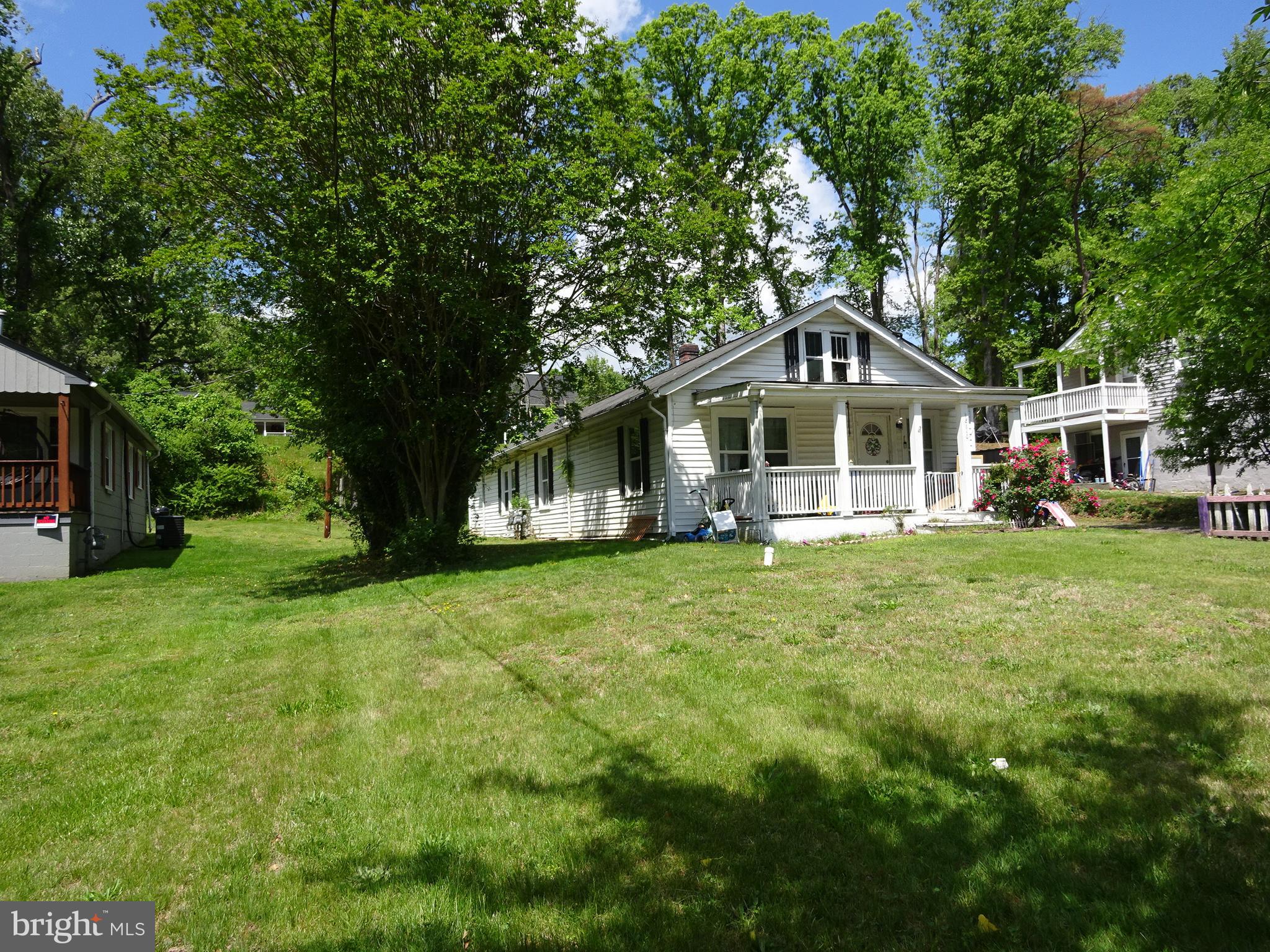 READ CAREFULLY:
This is an older home sitting on 1/4-acre lot being sold "AS IS". The home is currently being rented and will only be shown by appointment only. To schedule an appointment for showings, contact the listing agent directly. There are 2 homes located on this lot. The main home will require extensive renovations and the home behind the main home is a tear down and not safe to enter. The value is in the lot itself. Great location with tremendous opportunity for investors/builders. There are many new homes being built on Old Triangle Rd.
