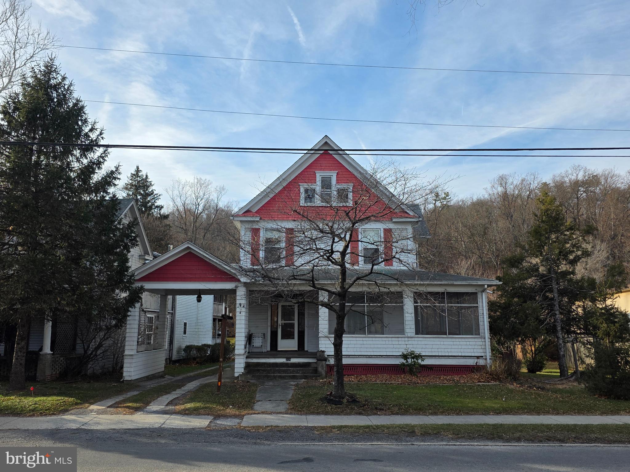 Charming 4-Bedroom Home in the Heart of Berkeley Springs! Welcome to 318 S Washington Street, where small-town charm meets everyday convenience at an exceptional price point. This delightful 4-bedroom, 1.5-bathroom home offers 1,705 square feet of comfortable living space in one of Morgan County's most sought-after locations. Nestled along the historic main corridor of Berkeley Springs, this property places you within easy walking distance of the renowned Berkeley Springs State Park, home to the famous warm mineral springs that have drawn visitors for centuries. Nature lovers and history enthusiasts alike will appreciate having this treasured landmark just moments from their front door. The convenient location extends beyond recreation. Families will value the proximity to local schools, making morning routines and after-school activities remarkably manageable. Downtown shops, local eateries, and essential services are all within reach, reducing your reliance on long commutes and keeping daily errands refreshingly simple.

Inside, generous square footage provides ample room for growing families or those who simply appreciate having space to spread out. With four bedrooms at your disposal, you'll find flexibility for home offices, guest quarters, or hobby rooms alongside comfortable sleeping arrangements.

This property represents a rare opportunity to establish roots in a community that beautifully balances peaceful mountain living with accessible amenities. Whether you're seeking a primary residence or a weekend retreat from city life, this home delivers genuine value without compromise.

Don't let this opportunity slip away. Schedule your private showing today and discover why Berkeley Springs has captivated residents for generations.