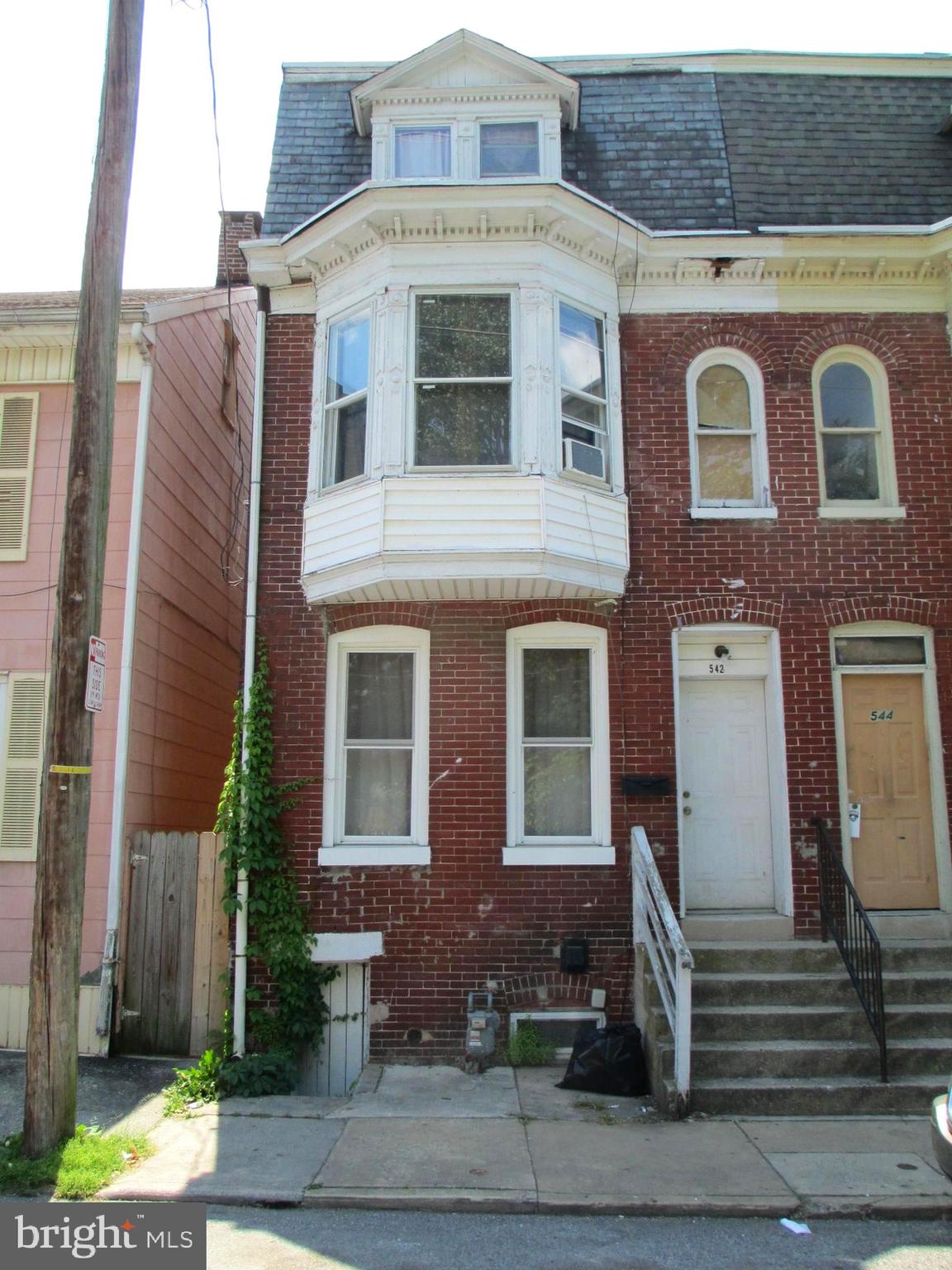 Priced to sell. Very affordable well kept home. Some new windows, some fresh paint. Featuring 4 bedrooms and 2 full baths. Parking in rear yard as well as on street. You can live in it or rent it out. Home was a two unit at one point. Great potential for investors!