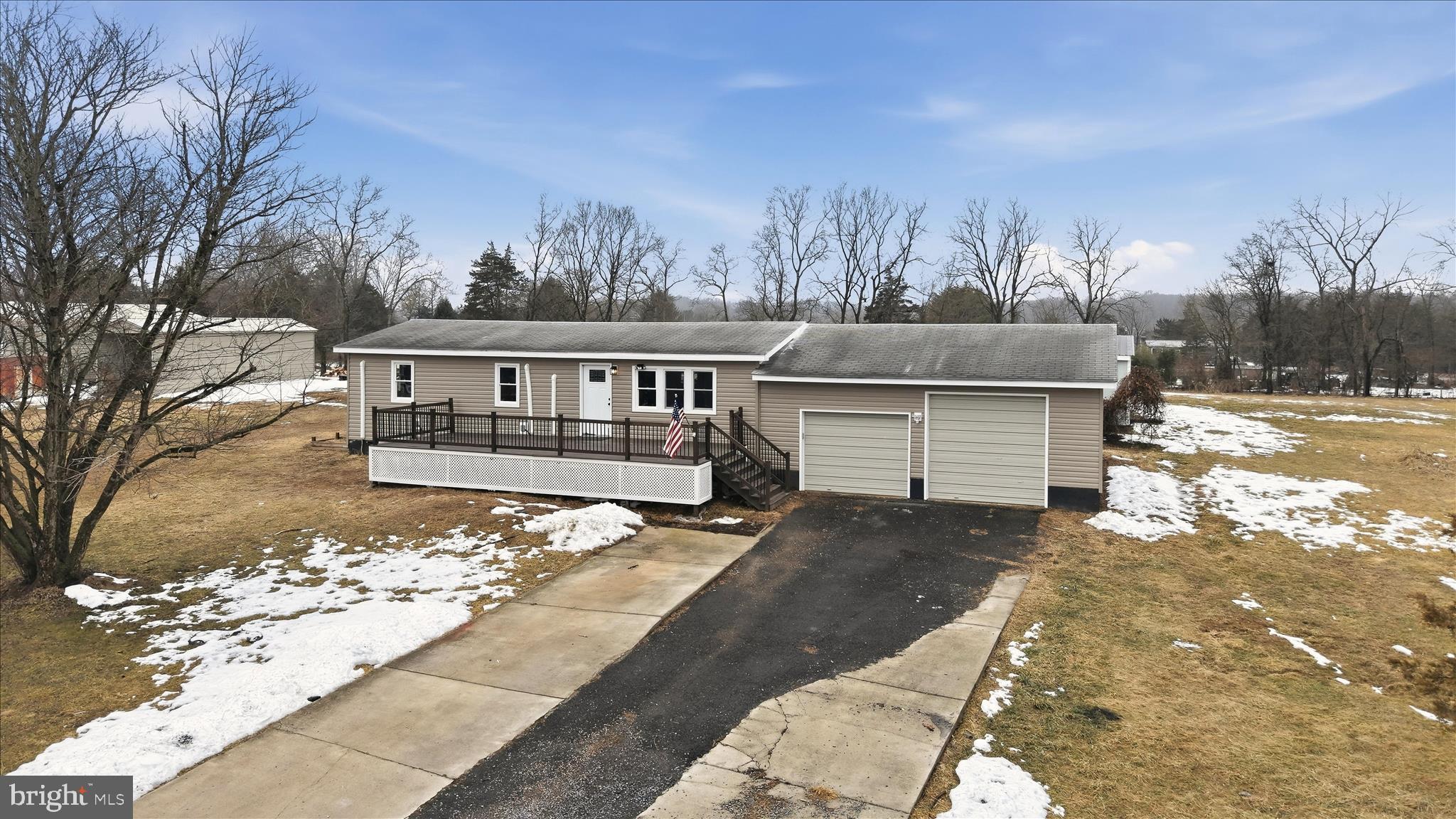 Single-level living with no HOA and a huge garage on a level 1.15-acre lot! This move-in ready rancher features consistent LVP flooring, an updated kitchen and baths, and a completely revamped exterior with new windows, insulation, sheathing, and siding (new roof will be installed before settlement). An inviting front porch and back deck add character and functionality to this 3-bed/2-bath home. The private primary suite features an en-suite bath, walk-in closet, separate office/sitting area, and access to the backyard. The secondary bathroom includes a walk-in tub, and there's also a separate laundry room with built-in storage for maximum efficiency within this compact footprint. In addition to the attached garage that offers plenty of space for vehicles, equipment, and other storage needs, the spacious lot affords tons of functionality with a separate shed and covered area for extra storage.  Situated in a peaceful community with proximity to Jefferson County amenities and surrounding areas, this single family residence offered at an affordable price point is the ideal place to call home!