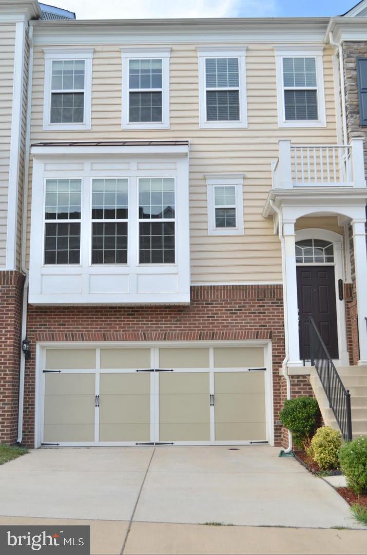 Gorgeous, Upgraded 4BR/3.5BA Townhome with 2-Car Garage!
Sun-filled and beautifully maintained, this spacious townhome offers high-end upgrades including hardwood floors, crown molding, and an open floor plan perfect for modern living. The large kitchen features upgraded cabinets, granite countertops, and plenty of workspace. Enjoy generous living areas with both a family room and living room, ideal for relaxation and entertaining. The primary suite includes a sitting area and a luxurious en-suite bath. A large deck and patio extend your living space outdoors.

Located in a desirable community with excellent amenities, close to shopping, restaurants, and the new Dulles Landing. Walk to commuter lot for added convenience.

Rent and enjoy this exceptional home and location!

Washer and dryer are included with the lease; however, tenants will be responsible for their maintenance and any necessary repairs during the lease term.