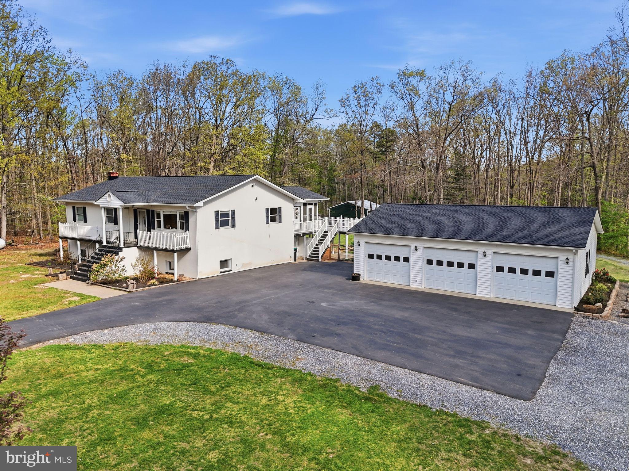 Set against the backdrop of the Shenandoah Valley in Elkton, this exceptional property offers the kind of space, flexibility and functionality that's becoming harder to find.
Situated on nearly 5 acres (4.9 to be exact), this 4-bedroom, 3-bath home delivers the perfect blend of comfortable living and practical versatility.  Inside, you'll find spacious bedrooms, a mostly finished  basement ideal for additional living or recreation space, and thoughtful updates throughout - including a new roof new HVAC and a updated appliances - giving peace of mind for years to come. 
Step outside and the opportunity  truly opens up.
The property features TWO separate 3-car detached garages, offering a rare total of six garage bays - a standout feature for the right buyer.  Whether you're a car enthusiast, collector or someone who simply values having room to store and protect your investments, this setup is hard to match. Looking for you own private home office? This one has that too!!   And if that isn't enough, there's also a generator to ensure your peace of mind. 
The nearly 5-acre lot offers room to breathe, while the fenced backyard creates a secure and welcoming space for pets or outdoor enjoyment.  And with convenient access to interstate 81, you're never far from where you need to be, while still enjoying the privacy and quiet of country living.
This is more than just a home-it's a property built for how you live, work and grow.
