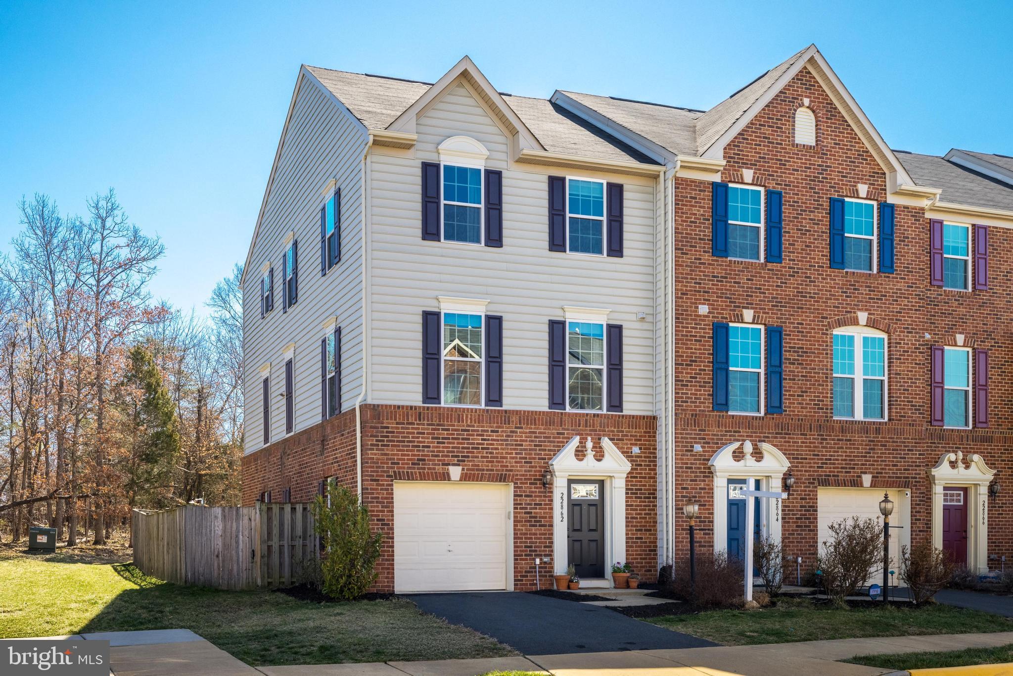 Welcome home to this bright and beautifully maintained 3-bedroom, 2.5-bath Strauss model in the sought-after Townes at Autumn Oaks community! This end-unit townhouse offers an open floor plan with tons of natural light, hardwood floors on the main level, and a beautiful kitchen featuring stainless steel appliances and granite countertops. The primary suite includes a private bath and ample closet space, while the lower level provides additional living space with a fenced-in patio and yard. Enjoy outdoor relaxation on the deck overlooking wooded views and the community playground. Additional highlights include a 1-car garage, easy access to the W&OD Trailhead just 0.3 miles away, and a prime location within 4 miles of Wegmans & Target and 6 miles from Dulles Airport. Don't miss this fantastic opportunity!
