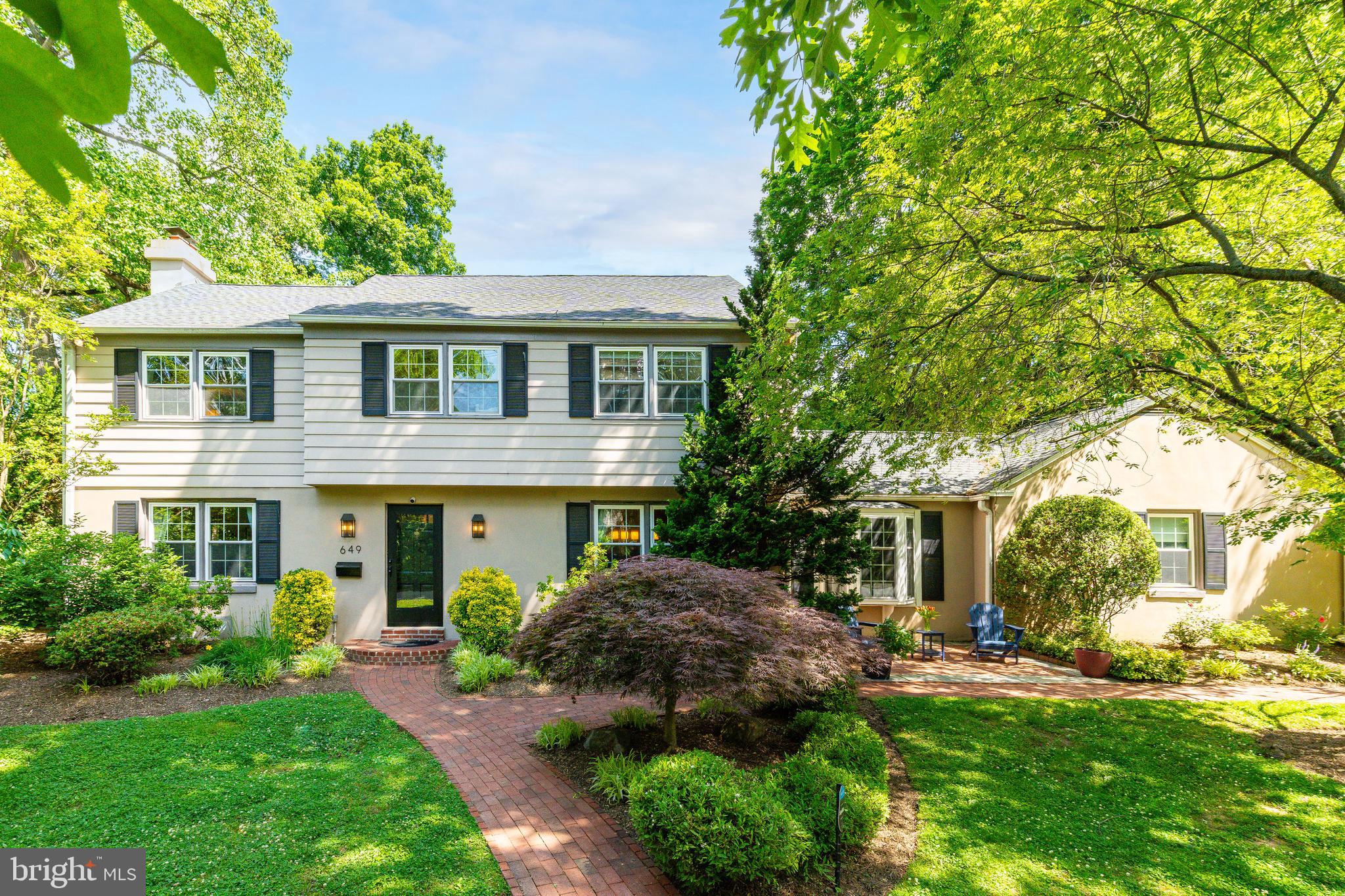 Set on a picturesque corner property in the Lower Merion School District, this beautifully maintained and thoughtfully updated Center Hall Colonial offers 4 bedrooms, 2 full and 1 half bathrooms, approximately 3,250 square feet of living space, a finished basement, and a two-car garage. Surrounded by mature trees, lush landscaping, and an expansive front yard, the home embodies the warmth, charm, and lifestyle that define Main Line living.
Designed for both everyday comfort and entertaining, the main level features a spacious living room with hardwood floors, oversized windows, crown molding, and a gas fireplace. The formal dining room is ideally situated between the kitchen and family room, creating seamless flow throughout the home while offering an elegant setting for both special occasions and everyday meals.
The custom eat-in kitchen offers rich wood cabinetry, granite countertops, recessed lighting, abundant prep space, a breakfast bar, and a sunny table area for casual dining. Appliances include a newer LG refrigerator (2023), Frigidaire double ovens (2025), Bosch dishwasher, GE cooktop, and newer LG washer and dryer (2024).
Just off the kitchen, the expansive family room serves as the heart of the home, featuring custom built-in library shelving, integrated office space, updated recessed lighting, newer carpeting, and double doors leading to the private patio. This versatile space also provides direct access to the attached two-car garage. A powder room and large entry closet complete the main level.
Upstairs, the primary suite features hardwood floors, a large walk-in closet, and an ensuite marble bath with a soaking tub and glass shower. Three additional generously sized bedrooms offer hardwood floors and excellent closet space, while the hall bath includes a double vanity and tub/shower combination.
The finished basement provides exceptional flexible living space ideal for a playroom, gym, media room, office, or additional storage and includes a wet bar with a mini refrigerator.
Notable updates include a newer roof (2020), newer hot water heater, windows, carpeting, stair runners, and recessed lighting. 
Outside, multiple outdoor entertaining areas provide the perfect backdrop for dining al fresco, hosting friends, or simply enjoying the peaceful surroundings. Beautifully landscaped grounds bloom throughout the spring and summer seasons, while the expansive front yard creates a true neighborhood feel where neighbors are often outside walking, biking, and gathering. Surrounded by mature trees and located on a quiet street, the setting offers the strong sense of community that makes this pocket of Wynnewood so special.
Located just minutes from Wynnewood Shopping Center, Whole Foods, South Ardmore Park, Suburban Square, downtown Narberth, train stations, restaurants, and local favorites including Ripplewood, Char & Stave, Sabrina's Café, Spread Bagelry, and Lu & Aug’s Ice Cream, this exceptional home offers the perfect blend of timeless character, modern functionality, convenience, and community.