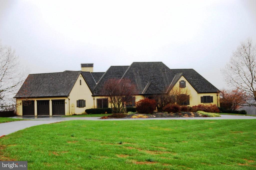 5 bedroom home in Lauxmont Farms Estates, 5.43 acres with panoramic view of the river and neighboring winery.  Custom kitchen with granite countertop and island.  Master suite with master bath and whirlpool tub.  Beautiful library for quiet reading.  Full basement with outside entrance and full kitchen.  French doors to outdoor entertaining on porch, deck, patio, and covered patio-enjoy the neighboring winery. Unfinished below grade 1,066 sq. ft.