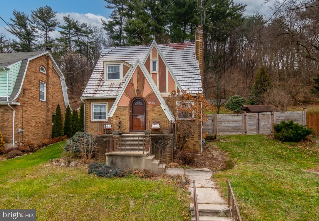 Full of Charm & Character this 3 Bedroom, 1 Bathroom Brick home backs to woods for privacy & features a patio and wood privacy fence. The living room & dining room are hardwood and a stone fireplace is perfect for those chilly nights. The custom kitchen boasts Butcher block tops and tile backsplash. Upstairs, there are two large bedrooms with small walk-in closets and the third is a little smaller. Bath is nicely updated with tile tub, floors & glass doors. Outside the big backyard is private & includes a shed.