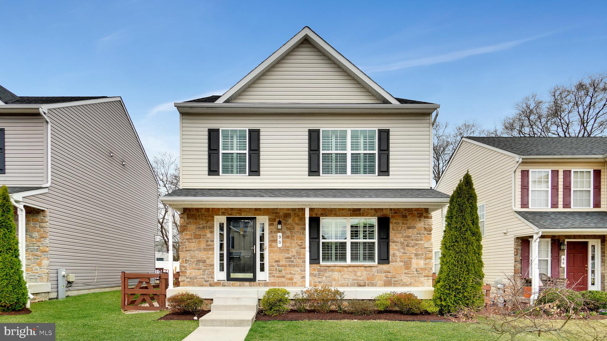 This charming colonial home welcomes you with gleaming hardwood floors and abundant natural light. The main level features a powder room, a spacious family room, a dining area, and a beautifully appointed kitchen with stainless steel appliances and granite countertops. Step outside to enjoy the maintenance-free deck with a retractable awning, overlooking a fenced-in yard with a generously sized shed.

Upstairs, you'll find three spacious bedrooms, two full bathrooms, and a convenient laundry area. The lower level offers even more living space with an additional family room, a versatile hobby room, ample storage, and an areaway leading to the backyard. This home blends comfort and functionality, making it a perfect place to call home!