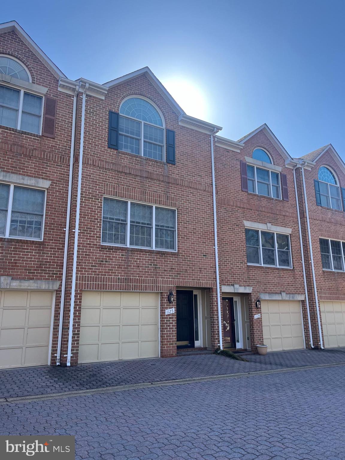 Nicely maintained and updated three level townhouse in the heart of Ballston. Cathedral ceilings in primary bedroom. Open floor plan with a gas fireplace serving the living room and dining area. Attached garage plus one parking pass for lot. Three bedrooms on the upper level. Fourth bedroom area or recreation room on entry level.  Private patio. Professionally managed.