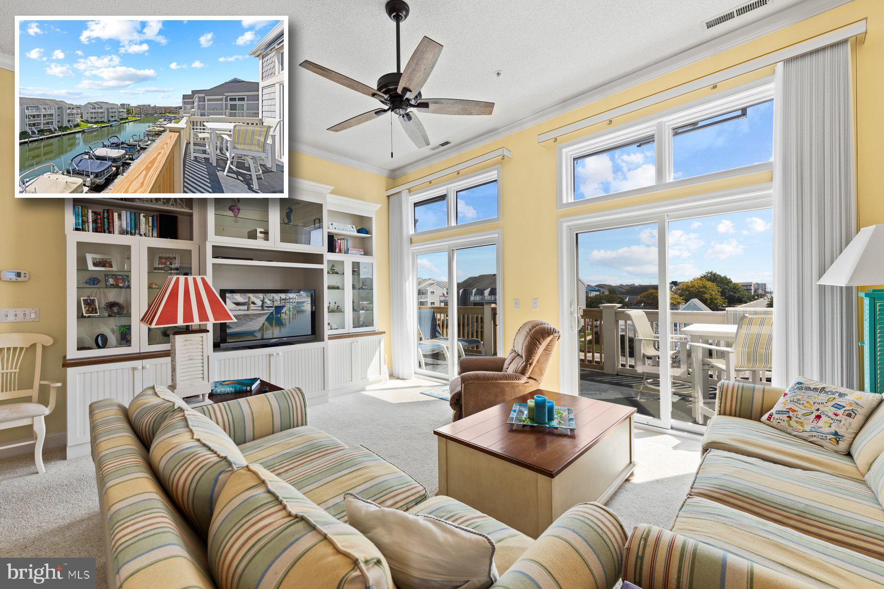 BEACH LIVING AT IT'S BEST!  Step into a sun-drenched haven where elegance meets comfort in this stunning 3 bedroom, 2 full bath condo.  Boasting 10.5 ft. ceilings, the open layout is enhanced by an abundance of natural light creating a warm and inviting atmosphere throughout.  The gourmet kitchen is a chef's dream featuring ss appliances, granite counters, 42 in cabinets, and a spacious pantry.  The Primary bedroom suite is a private retreat complete with a luxurious bath offering two separate vanities.  Outdoor living is a delight with both front and back balconies including a spectacular 28x8 rear balcony equipped with a retractable awning - perfect for enjoying serene canal views.  Conveniently located across from the community pool, playground and volleyball courts along with being 3 blocks from the beach, this home offers a lifestyle of leisure.  A boat slip with a lift is included making it easy to explore the water at your whim.  Just steps away, Northside Park offers fields, crabbing, and a fishing pier for endless outdoor enjoyment.  The furniture conveys making this property truly move-in ready!