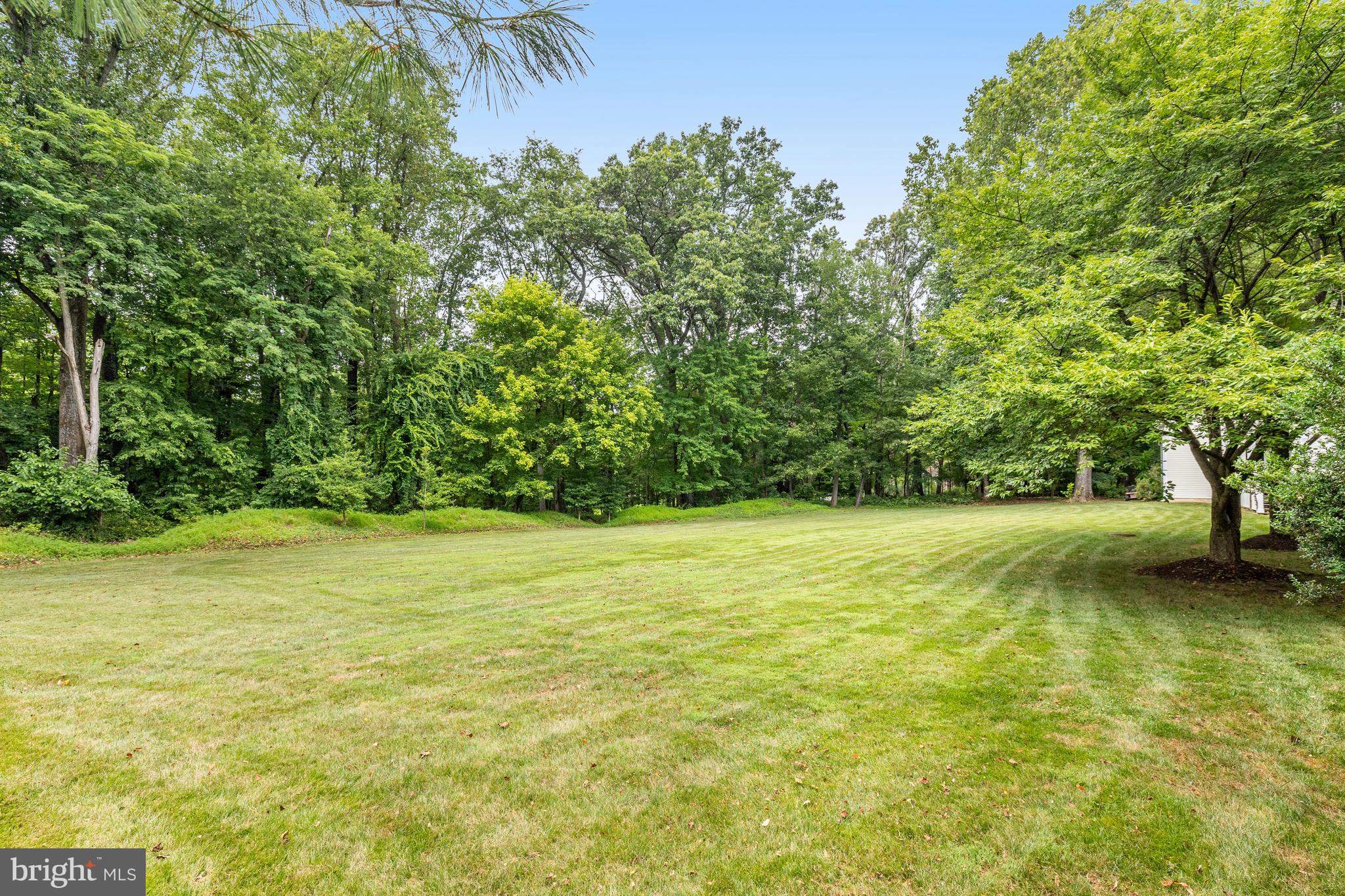 Charming, Renovated Farmhouse with Modern Amenities and Beautifully Landscaped Yard on 1.79 Acres
Step into the warmth and charm of this beautiful farmhouse, featuring a welcoming wrap-around porch and heart pine floors. This 6-bedroom, 5.5-bathroom home offers light-filled rooms throughout, creating an inviting and cheerful ambiance.
The heart of the home is the gourmet kitchen, complete with a 5-burner gas range and ample counter space. Adjacent to the kitchen, the breakfast room boasts a cathedral ceiling and windows on all three sides, providing a perfect spot to enjoy your morning coffee while soaking in the natural light.
The living and family rooms both feature 10-foot ceilings and large windows, offering lovely views and bathing the rooms in natural light. These spaces are perfect for entertaining or simply relaxing with family and friends. The dining room, with a convenient pass-through to the kitchen, makes hosting dinners a breeze and adds to the home's functional charm.
The upper level is home to the owner's suite, featuring cathedral ceilings with beadboard, a renovated bathroom with a soaking tub, large frameless glass shower, and dual vanities. Additionally, there is an ensuite bedroom with a renovated bathroom, two more bedrooms sharing a hall bathroom, and a main level bedroom ideal for guests or home office
A detached garage is conveniently connected to the home via a covered walkway. Above the garage, a private suite awaits, complete with a wet bar and full bath—perfect for guests or as an in-law suite.
Outside, the beautifully landscaped yard offers a serene retreat, nestled on a quiet cul-de-sac. Sited on 1.79 acres, this idyllic setting provides peace and privacy, making it an ideal place to relax and unwind.
Embrace the blend of rustic charm and modern luxury in this exceptional farmhouse. Make it yours today!