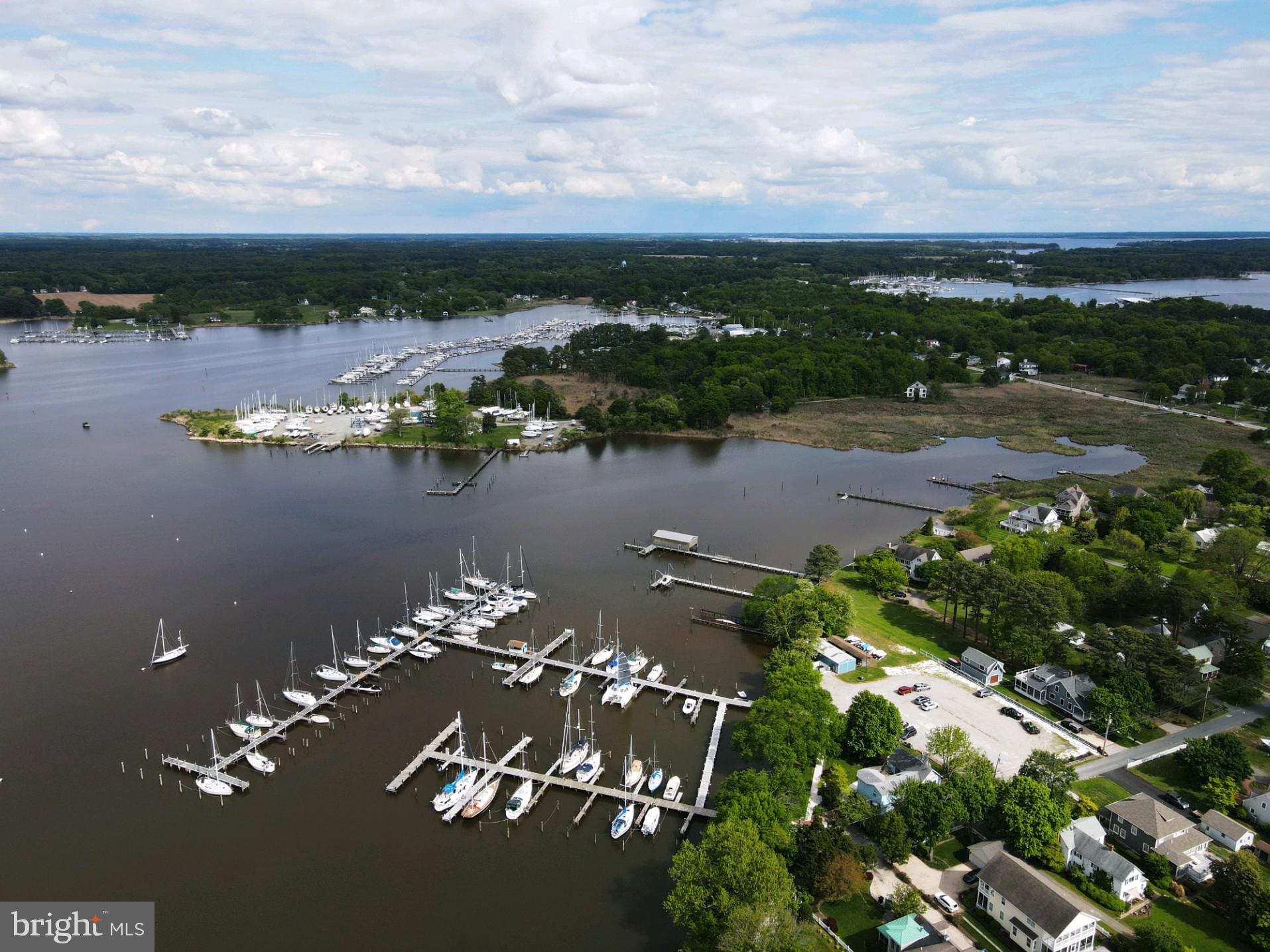 This revised offering for Swan Creek Marina includes 6043 Lawton Ave AND 6119 New Street. 6043 Lawton has a 100 slip marina, office and 2,343 sq.ft. house on 1.36 acres and 22 moorings with 5-6 ft MLW on Swan Creek. 6119 New Street is a 8.4 acres dry storage yard with 2000+ ft of shoreline on Swan Creek.  Swan Creek Marina is a popular marina that has been owned and operated by the same family for three generations and enjoys a dedicated long term customer base.  A detailed offering package is available.
