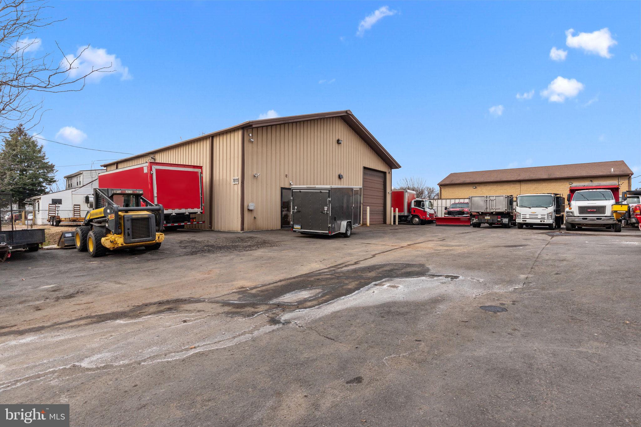 **BACK ON THE MARKET** Turnkey Gated Commercial Zoned M2 Property on .41 Acres | Shop, Offices & Storage!  This well-maintained and highly functional commercial property sits on .41 acres and offers the ideal setup for a landscaping company, roofing company, automotive, contractor or service-based operations. Fully gated with ample parking, the property provides both security and convenience in a layout designed for efficiency and growth. The main building features a spacious shop equipped with a vehicle lift and a dedicated shop bathroom, making it perfectly suited for hands-on operations. The office area includes a private entrance, two offices, and a separate office bathroom, creating a professional environment for client meetings and day-to-day administration. Enhancing the property’s versatility are a detached garage and two large rear storage containers, offering exceptional space for equipment, inventory, or additional storage needs. With its secure yard, flexible improvements, and practical design, this property is an excellent opportunity for an owner-user or investor seeking a move-in-ready commercial space with room to operate and expand.