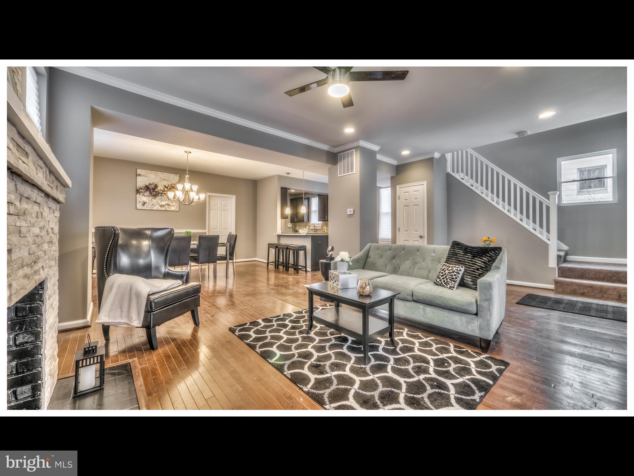 NEARLY2,800SQFT HOME COMPLETELY RENOVATED 5BR/4BA. WOOD FLOORS IN LIVING/DINING ROOM,NEW KITCHEN W/GRANITE COUNTERS, STAINLESS APPLIANCES & BREAKFAST BAR. HUGE MASTER BEDROOM SUITE W/NEW LUXURY BATH ON UPPER LEVEL W/2 BEDROOMS & BATH.INLAW SUITE ON MAIN LVL FINISHED LOWER LVL W/BEDROOM, BATH, AND COMMON AREA FOR ENT.DECK ON 1ST & 2ND FL  OVER LOOKING LARGE LVL YARD & OFF ST PARKING &18MO WARRANTY.