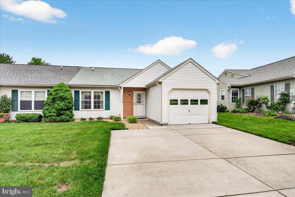 Honored to present another wonderful Crestwood Village home! This 2-bedroom 2 full bath Chesapeake Model duplex has been updated and lightly lived as a summer home for more than 20 years. Updates include a 6 year old roof, 6 year old heat pump (they kept the base board heaters as back up) and an 8 year old water heater. Recently painted and ready for you! The owners had the small side patio enclosed to use as an office and installed a retractable awning over the large rear patio. Crestwood Village 1 is a vibrant 55+ community offering a wealth of amenities, including a clubhouse, fitness center, library, banquet room, game and billiards rooms, swimming pool, mini golf, tennis and pickleball courts, horseshoes, shuffleboard, and more. The HOA covers lawn care, gutter cleaning, basic cable and snow removal—plus, there are no city taxes! You’ll love the convenient access to shopping, dining, Downtown Frederick, and major commuter routes. Don’t miss your opportunity to make this beautifully updated home your own!
