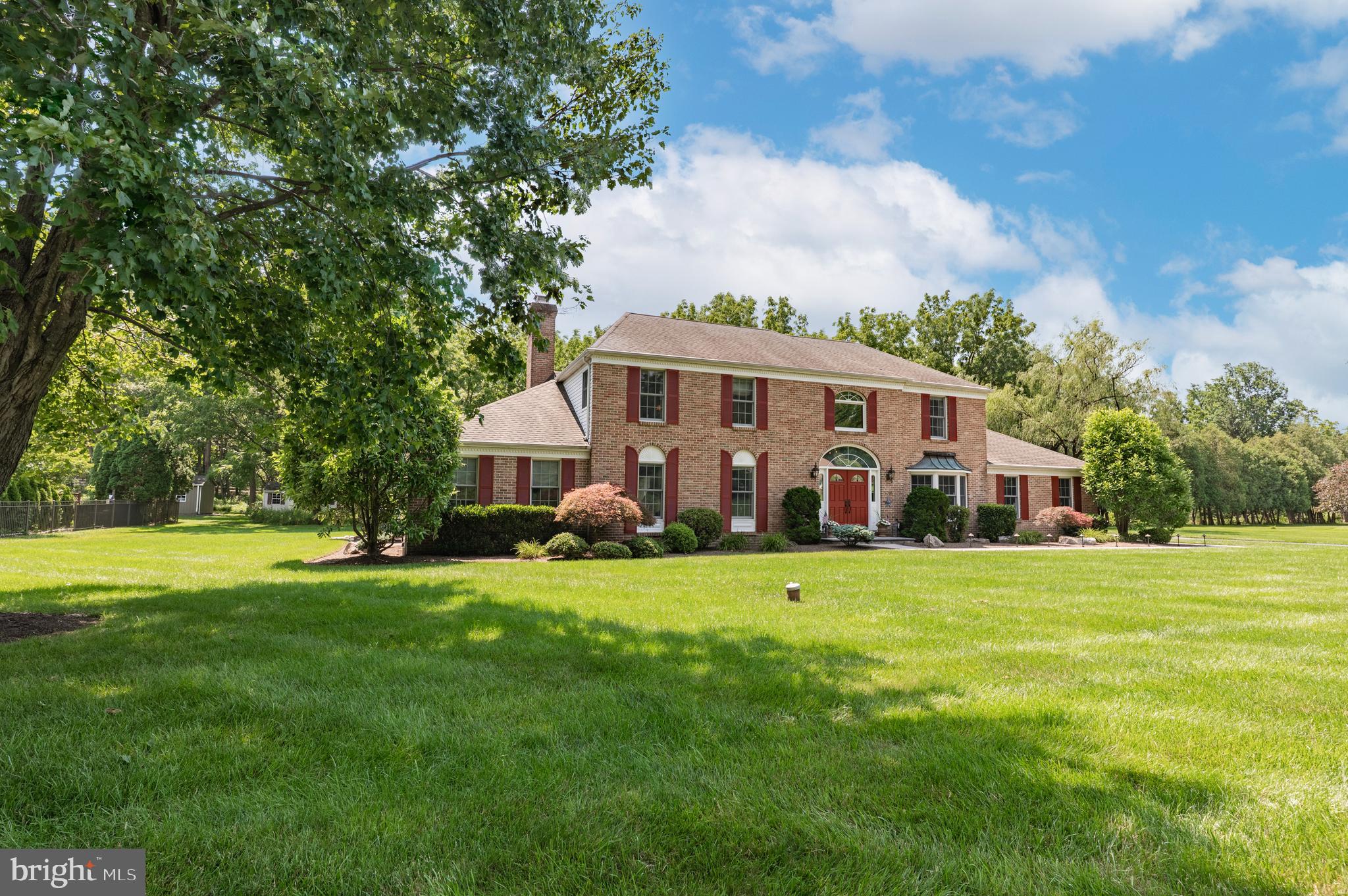 Absolutely gorgeous custom and completely updated home in Hunters Run situated on a lushly landscaped lot with mature trees and plantings.  This stunning home is both tasteful and elegant and features all of the best upgrades and attention to details.....All new or newer Anderson windows, 
 windows on the first floor with UV protectant, newer random set wide plank hardwood floors, 4 fireplaces (1 exterior), extensive crown moldings, chair rails, wainscoting, trim work, high ceilings, 1st floor custom bar/pub room, 1st floor office/den (currently set up as an exercise room) with the possibility of a first floor in-law/au pair suite or 5th bedroom with a separate entrance.   2 zone HVAC, dimmable recessed lights, newer carpet, ceiling fans, oversized and refurbished side entry garage with polyurea base and polyaspartic top coat floor (2023), built in cabinets, first floor windows and doors security system......The list goes on and on with this property.  The 1st floor consists of a 2 story foyer with double entry door with beveled glass and side lights and a dramatic & beautiful oak turned staircase with curved rail landing.  Elegant formal living room and formal dining room w/triple window. Beautiful custom kitchen (remodeled in 2019) with oversized island and stunning/unique pendant lights, stainless steel appliances, Quartz and Granite counter tops, oversized ceramic farm sink, soft close cabinetry, separate kitchen bar area, built in pantry cabinets and a very cozy floor to ceiling stone fireplace with Oak mantle.  Large family room off the kitchen with floor to ceiling stone fireplace and triple window leads to a incredible separate bar/pub room with another side of the floor to ceiling stone fireplace, French doors, wet bar, built in cabinetry and wine refrigerator.  1st floor large office/den is currently set up as an elite exercise room with a 15 amp circuit for treadmill, cedar walls, mini split system and separate entrance to the home.  Powder room has a raised ceramic basin sink, waterfall faucet and quartz countertop.  The first floor is completed with a good sized laundry room with built in cabinets, coat closet and entry to garage.  Upstairs you will find a large landing with curved oak railing and the entrance to the main suite is accessed through double doors with large bedroom area, large vanity room, large walk in closet with built ins and a gorgeous light and bright main bathroom complete custom in-laid tile, walk in shower, large soaking tub, large skylight and double sized linen closet.  Additional bedrooms offer double closets and the hall bath has a large tile shower/tub with built in ledge, octagonal window and double sinks.  The full basement is enormous with extra ceiling height, electric/oil heat (AC and heat pump 2025), water heater (2024), 2 sump pumps, large oil tank, new water conditioner/ neutralizer system and a basement dry system has been installed.  The rear yard is a story book setting with a custom inground pool featuring built in water fountains (refinished 2024). Stone paver patio with awning and a huge stone custom curved bar with a built in grill, granite countertop a huge stone fireplace.  The pool area is enclosed with a black metal fence.  Beyond the fence is a lovely wildlife backdrop with mature trees and walking paths.  This gorgeous home is tasteful, elegant and extremely well cared for. A real gem and pride of ownership is apparent throughout.