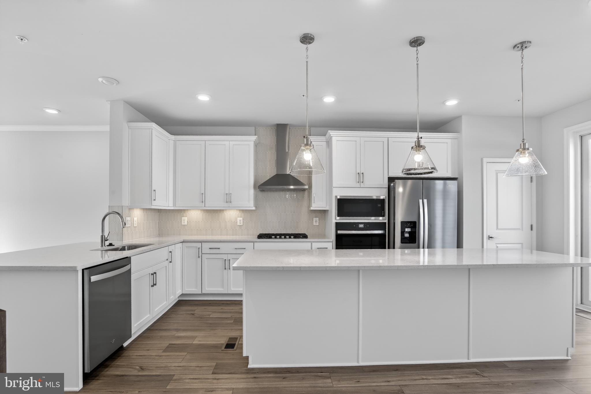 **OFFERING UP TO $25K IN FLEX CASH WITH USE OF APPROVED LENDER AND TITLE! Lower your price, cover your closing costs, or buy your rate down**
*****BRAND NEW CONSTRUCTION HOMES AT GREENLEIGH AT CROSSROADS****  
MOVE-IN READY! Featuring one of our newest modern floor plans, The Pratt. A 2-car rear garage townhome. This exceptional gem is a seamless blend of sophistication, convenience, and contemporary design, providing a truly elevated lifestyle. Featuring 3 bedrooms and 3.5 baths spread across three finished levels, a generous 1916 sq. ft. of living space. The interior is designed to be bright and light, with 9 ft. high ceilings creating an airy and spacious ambiance. The open floor plan of the Pratt is perfect for entertaining, allowing for seamless flow between the living and dining areas on the main floor. Huge primary suite with large walk-in closet. The primary bathroom has a double bowl vanity and oversized shower with seat. Convenient second floor laundry room.