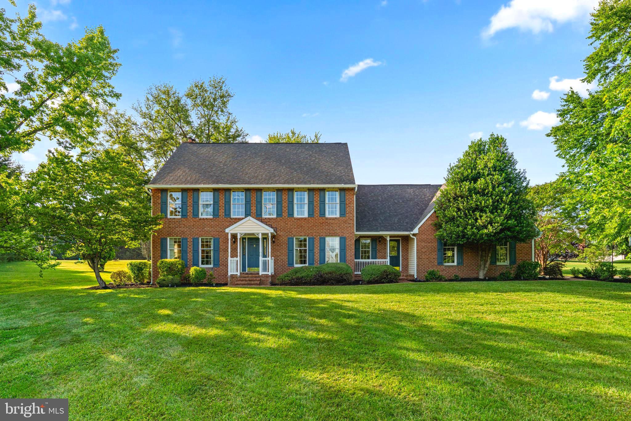 Welcome to this stately brick home, beautifully maintained and thoughtfully updated, offering 5 bedrooms, a 3-CAR GARAGE and situated on 3.37 private acres with no HOA. Blending timeless character with modern conveniences and exceptional outdoor living spaces, this property truly stands apart.

Step outside to enjoy the expansive deck overlooking the  SPARKLING POOL and CABANA— the perfect setting for relaxing or entertaining. A stocked goldfish pond creates a peaceful backdrop for summer evenings, while the gazebo provides a practical covered space for gatherings and outdoor enjoyment.

Inside, you’ll be welcomed by handsome hardwood floors and a stunning oak staircase accented with elegant trim details. A formal dining and living room offer elegant spaces while the family room features a raised-hearth brick fireplace, creating a warm and inviting focal point. The kitchen is well-appointed with granite countertops (2015), ceramic tile backsplash, dishwasher (2020), microwave, gas cooktop with downdraft (2015), and newer double ovens and refrigerator (2025).

A MAIN-LEVEL BEDROOM with a separate exterior entrance offers ideal accommodations for guests, extended family, or flexible living arrangements.

Upstairs, the spacious primary suite includes direct access to an adjoining bedroom — perfect for a nursery, home office, or sitting room. And there’s more — a HARDWOOD STAIRCASE LEADING TO THE ATTIC presents an exciting opportunity to create additional living space, such as a bedroom, bonus room, or private retreat.

Two additional bedrooms and a hall bath complete the upper level.

The lower level, refreshed in 2024 with new paint and carpet, provides versatile space for recreation, hobbies, or family fun. Two large storage areas offer abundant storage, and the WORKSHOP PROVIDES DIRECT ACCESS TO THE GARAGE for added convenience.

Assigned schools for the 2026–2027 school year include Dayton Oaks Elementary, Folly Quarter Middle, and River Hill High School.

Major updates include a HOUSE AND CABANA ROOF REPLACED IN 2021, ELECTRIC WATER HEATER IN 2019, and WELL TANK IN 2021.
Heat Pump - whole unit May, 2014
Garage Doors August, 2013
Hardwoods Family Room, 2019
Gazebo Roof, 2017
Pond renovated  2023
Pool pavers redone 2026
Toilets replaced 2024