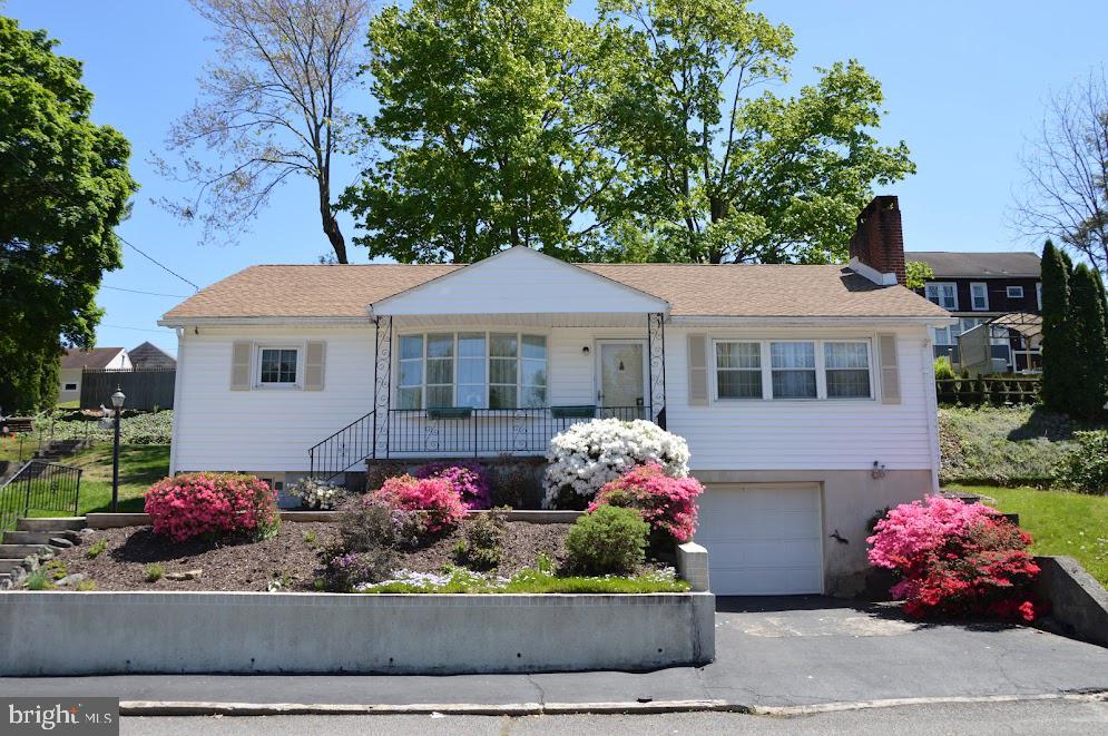 This well-built 3-bedroom, 1.5-bath ranch is perfectly situated just steps away from the local schools, sports complex, and public swimming pool. Enjoy easy access to the nearby walking paths and recreation area, making this a dream spot for active lifestyles. Clean, sturdy, and move-in ready, it offers the perfect canvas for your modern updates. Featuring a newer roof, replacement windows, and an updated electric panel. With a partially finished basement for extra living space, a 1-car garage, and all appliances included (kitchen + laundry), this home is ready for your personal touch.  Call for your private tour today!