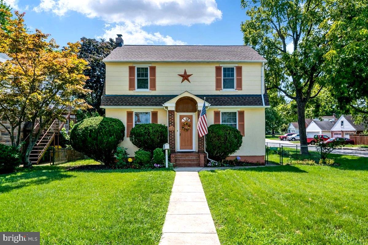 A beautiful classic colonial AND a car enthusiast's dream!  The Detached garage includes a separate electric panel, insulated dry wall,  vinyl siding, insulated garage doors, extra side entrance from the back of the house, architectural roof with ridge vents,  3 garage door openers and 6 remotes.  The home features a beautiful updated kitchen with white cabinetry and corian counters.  The main level also offers a family room off the kitchen,  spacious living room and formal dining area, with another separate room for possible office/study/sitting room, and a full bath.  There is also a 3 seasons sun room off the kitchen with a door to the fenced in back yard, and brick patio.   The second level features another full bath plus 4 spacious bedrooms.  The basement offers a partially finished room for possible rec/exercise/hobby room.  There is also a storage area, separate laundry room with a private flush, workshop area and utility area.  NEW ROOF in 2019! Replacement Windows! Updated Kitchen!  Convenient location for commuting to Baltimore, Annapolis and Fort Meade.   Walking distance to 10th Ave Recreational Park with baseball/softball fields, playground, soccer and basketball!